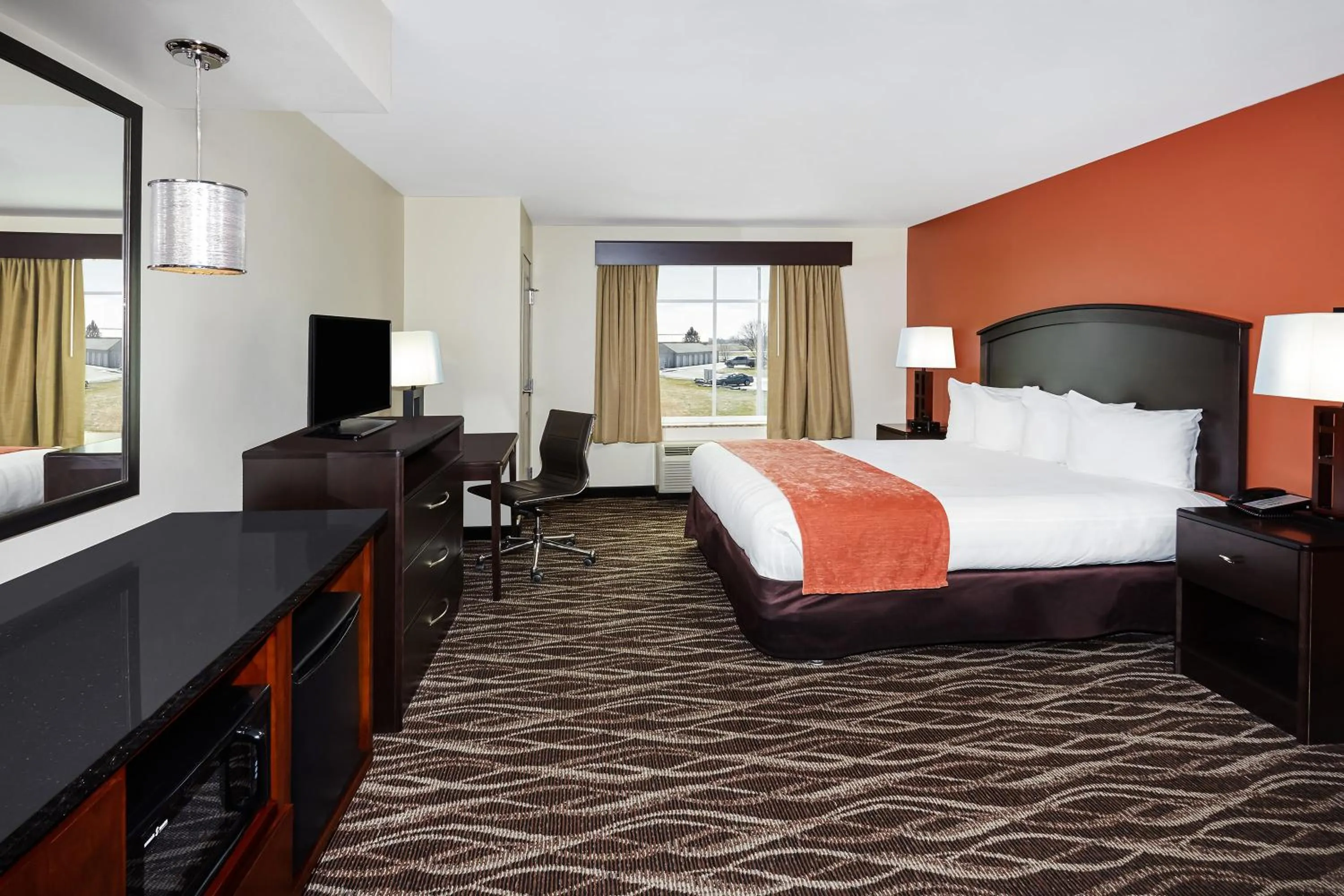 Hot Tub, Bed in AmericInn by Wyndham Waupun
