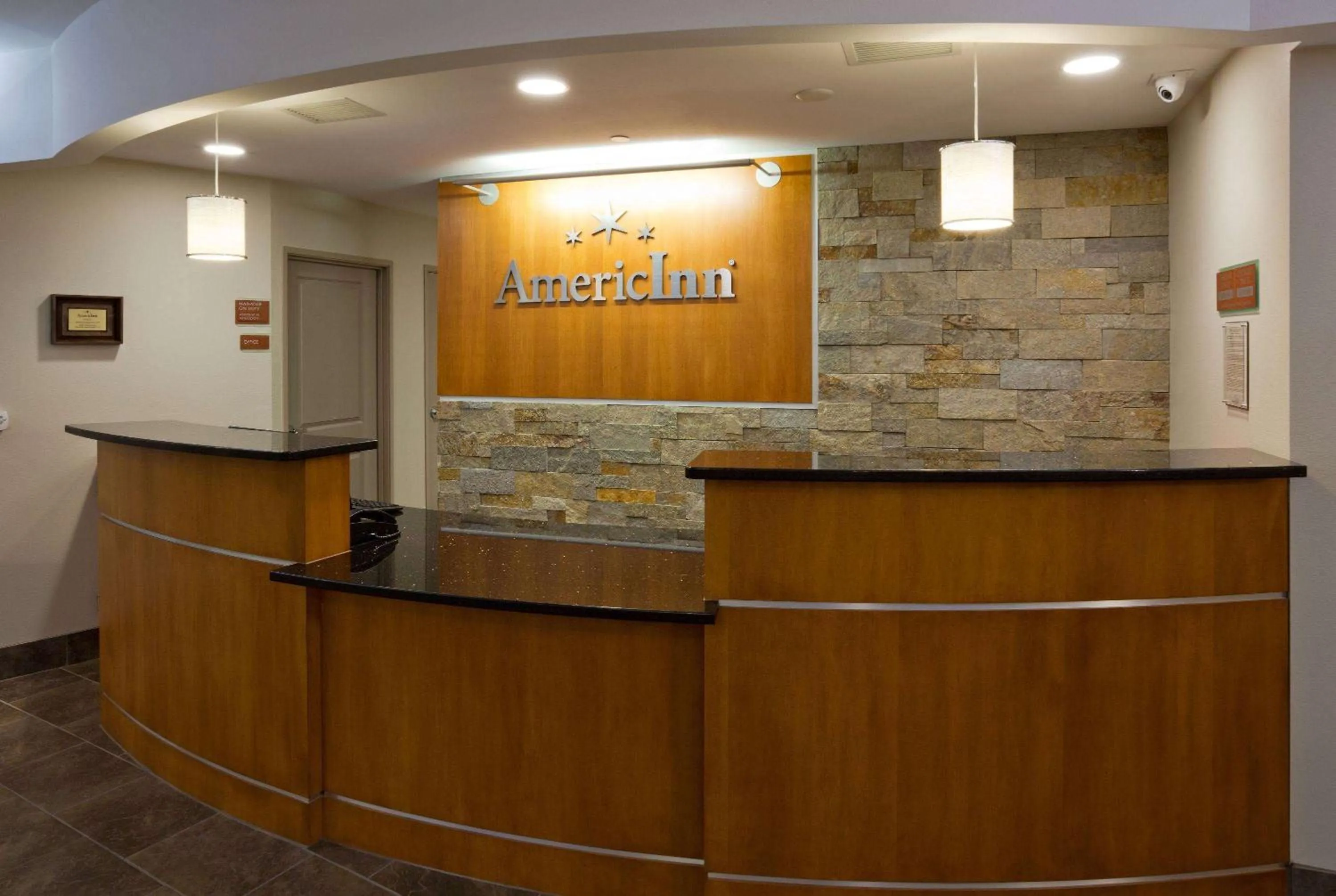 Lobby or reception in AmericInn by Wyndham Waupun