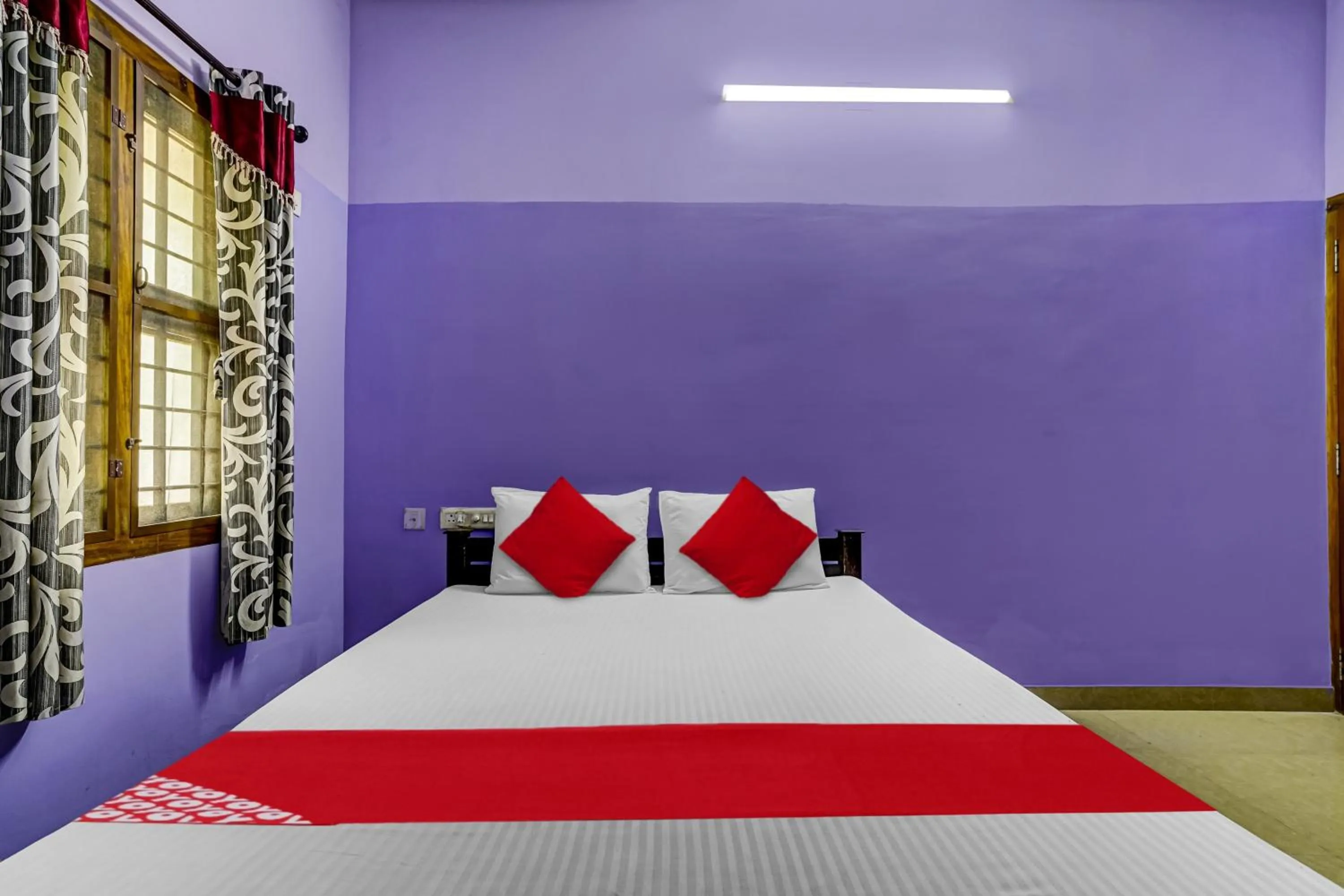 Bedroom in Hotel O Paradise villa