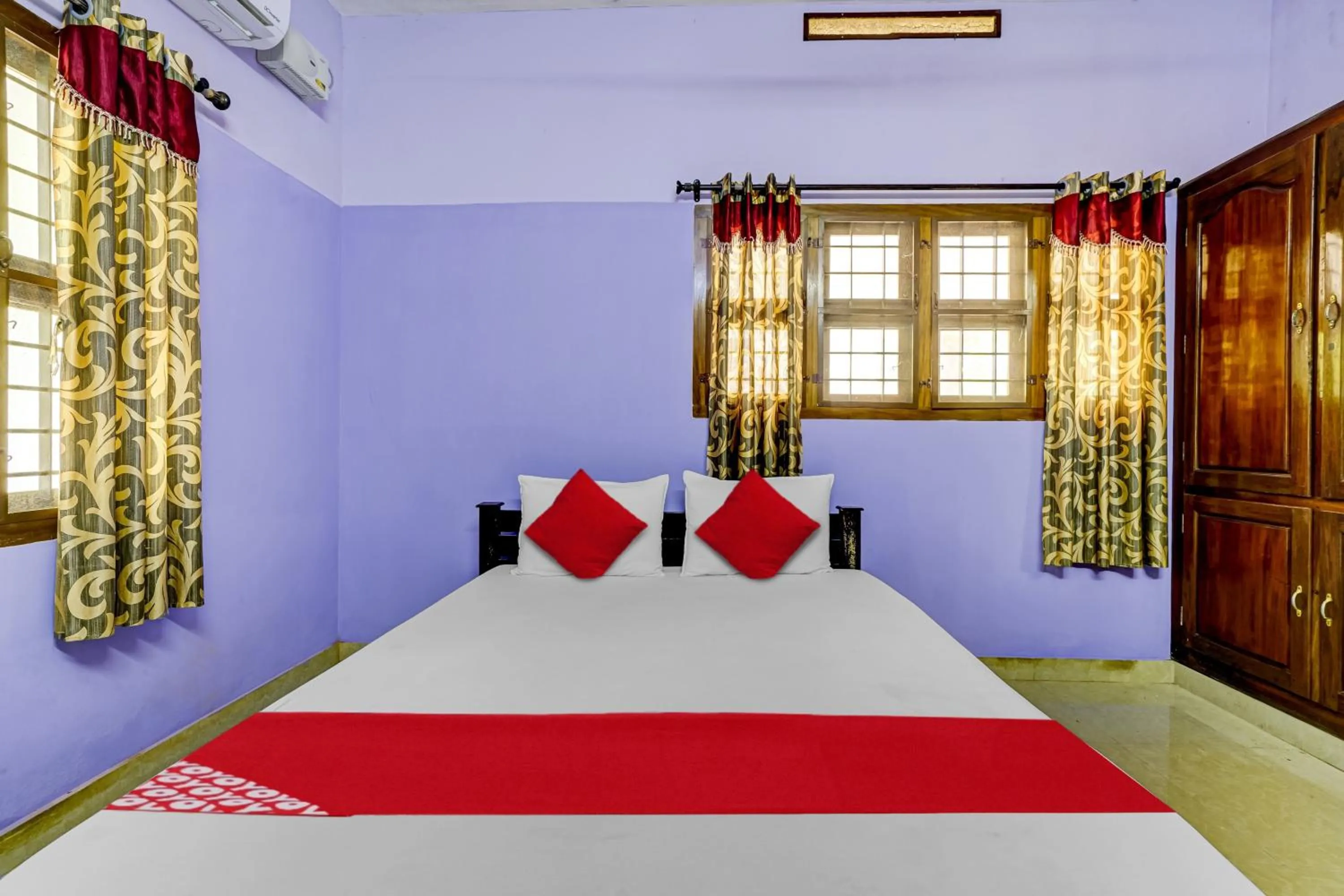 Bedroom in Hotel O Paradise villa