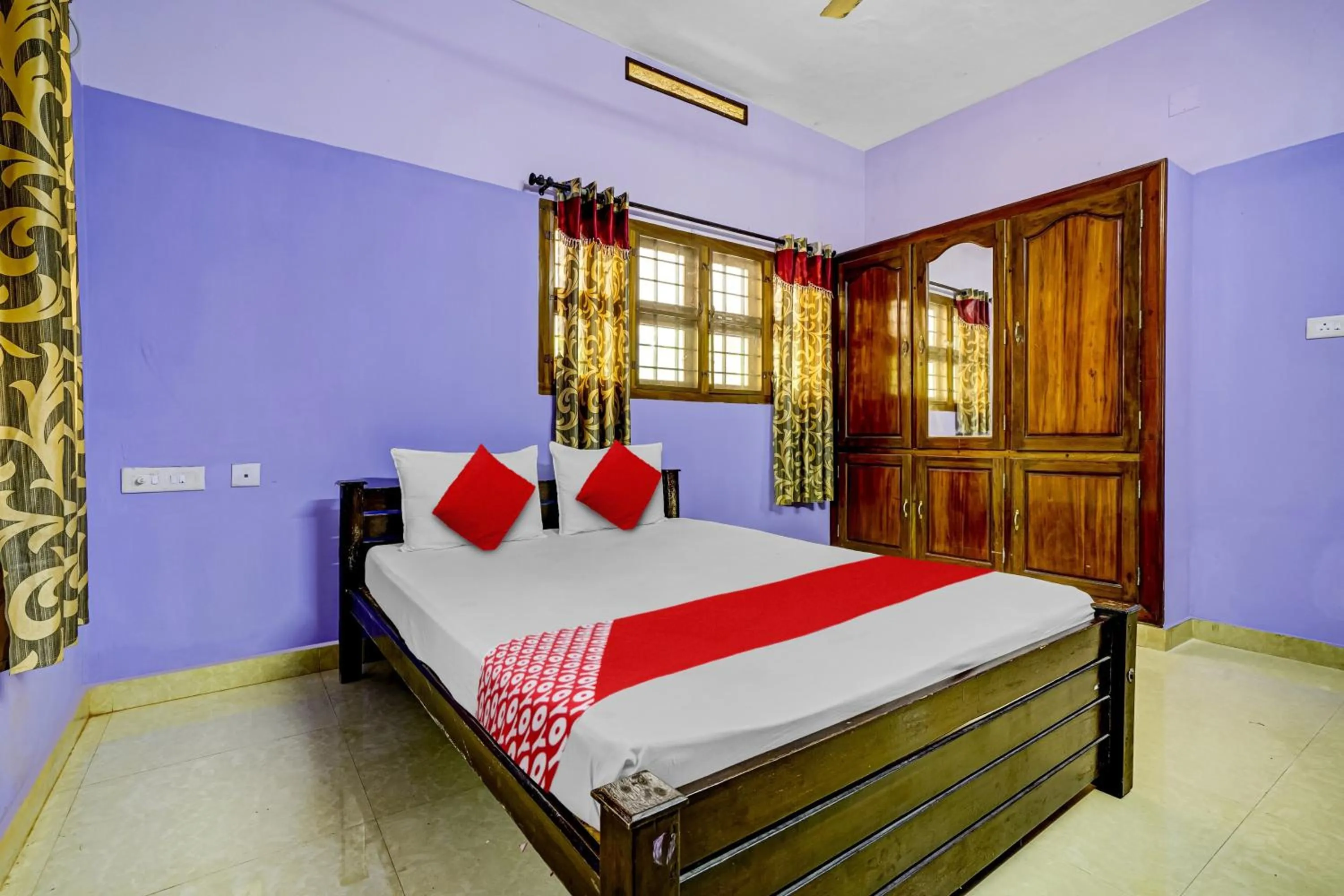 Bedroom in Hotel O Paradise villa