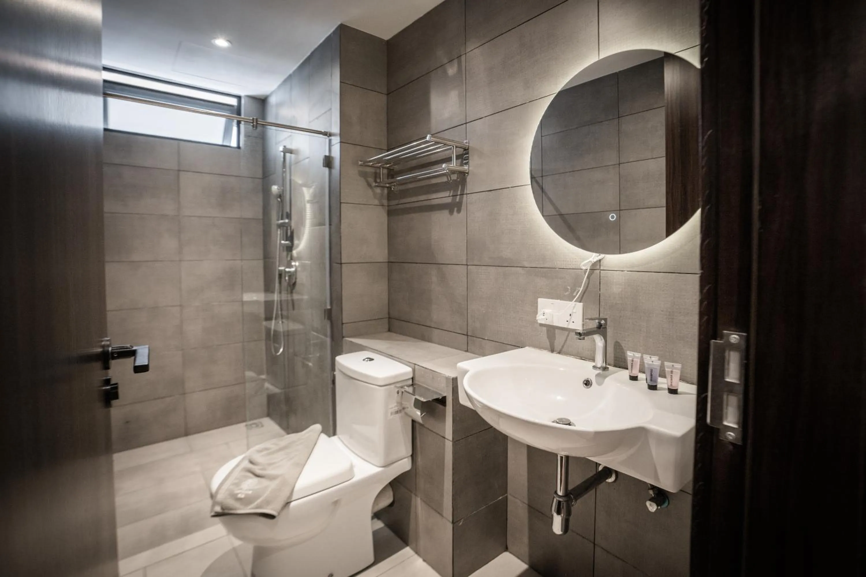 Bathroom in K Avenue by Pinstay