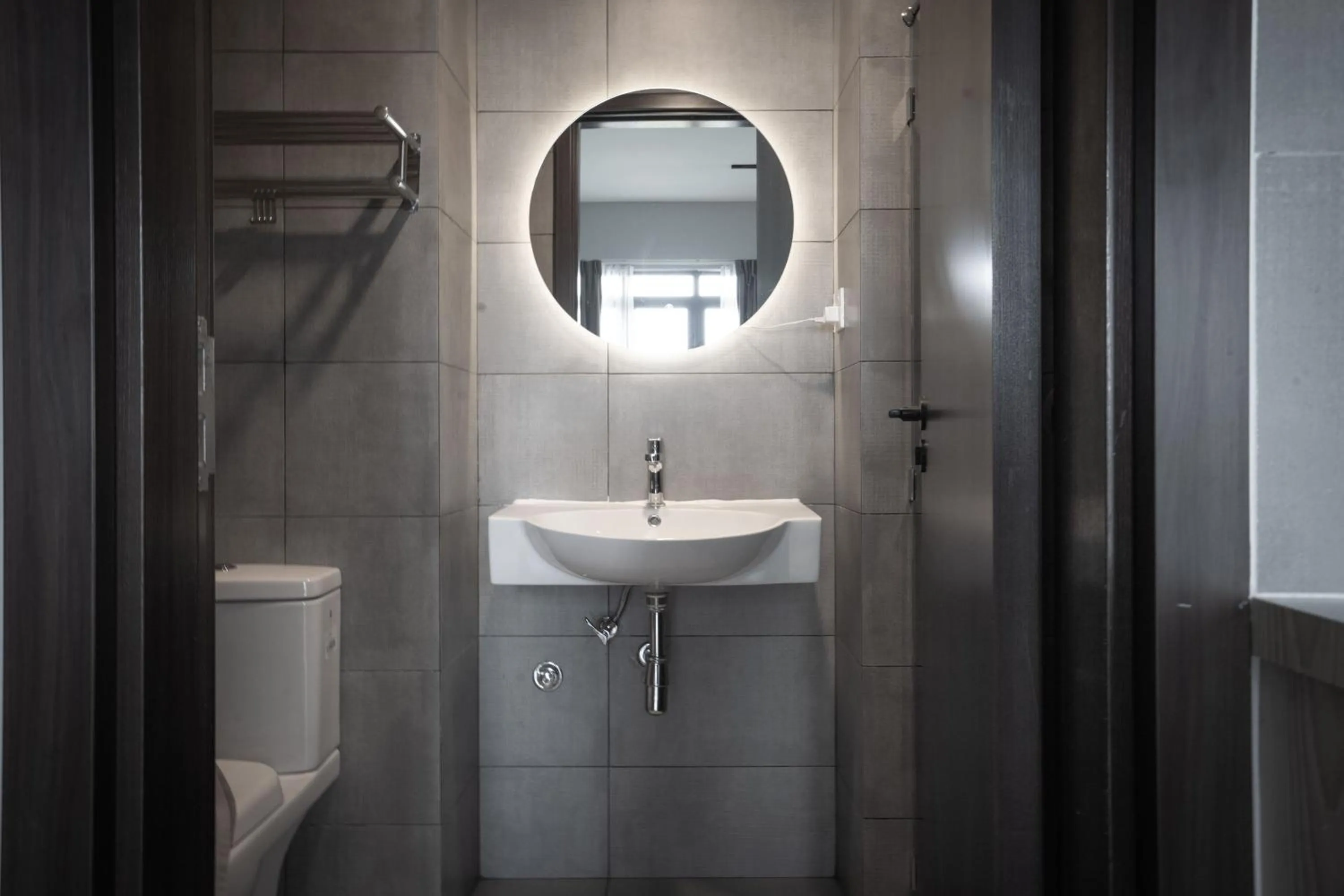 Bathroom in K Avenue by Pinstay