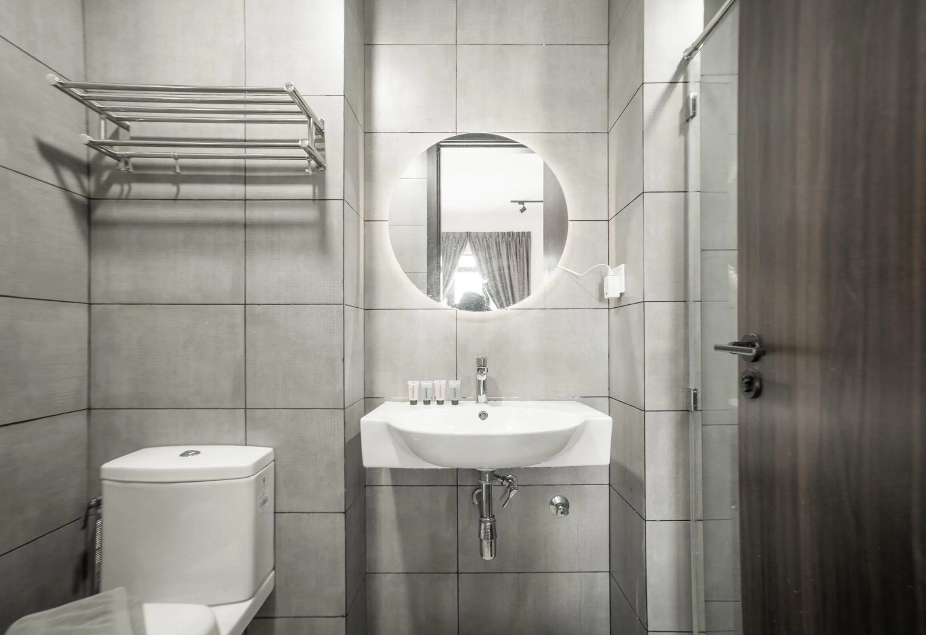 Bathroom in K Avenue by Pinstay