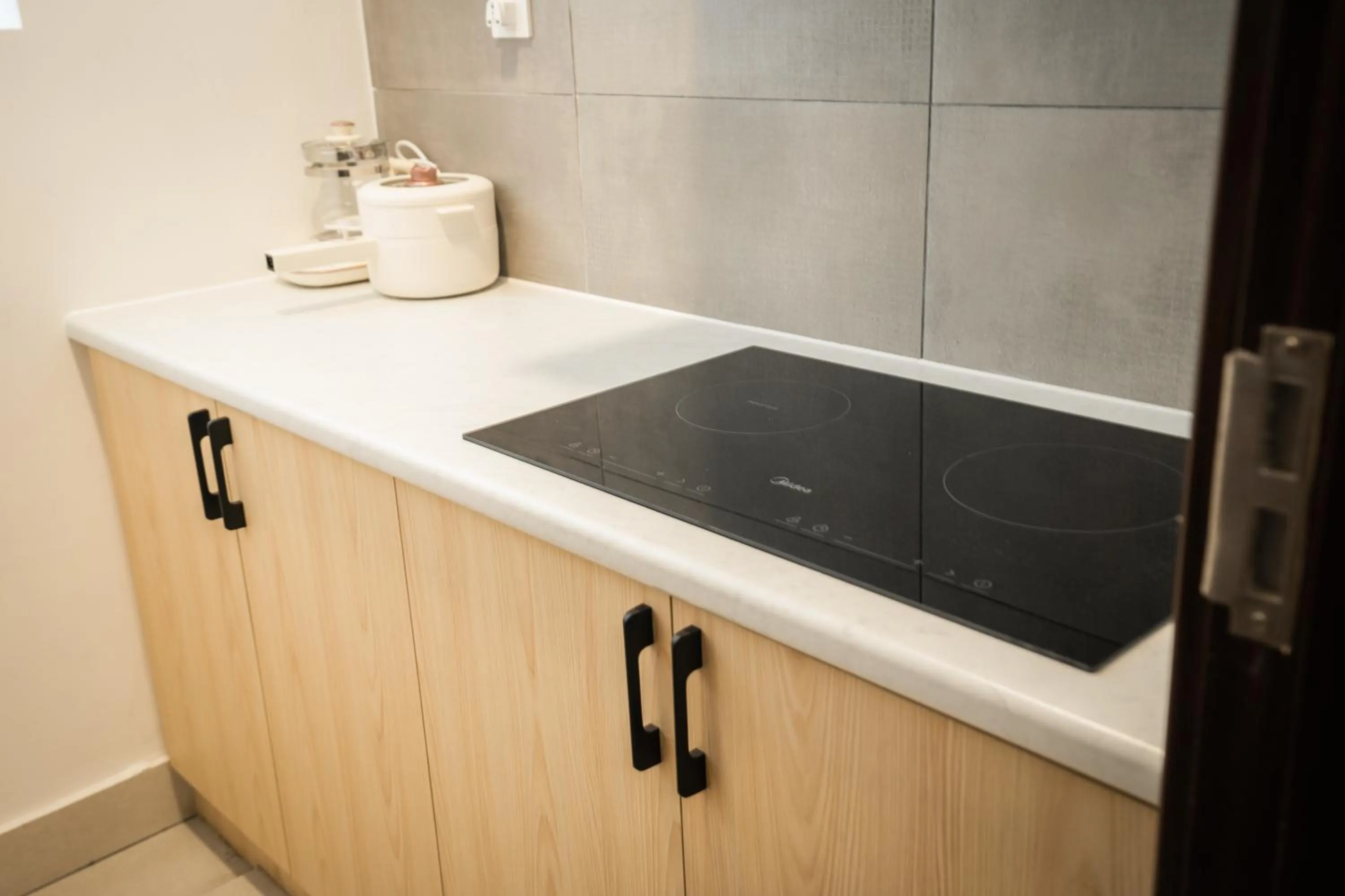 Kitchen or kitchenette in K Avenue by Pinstay