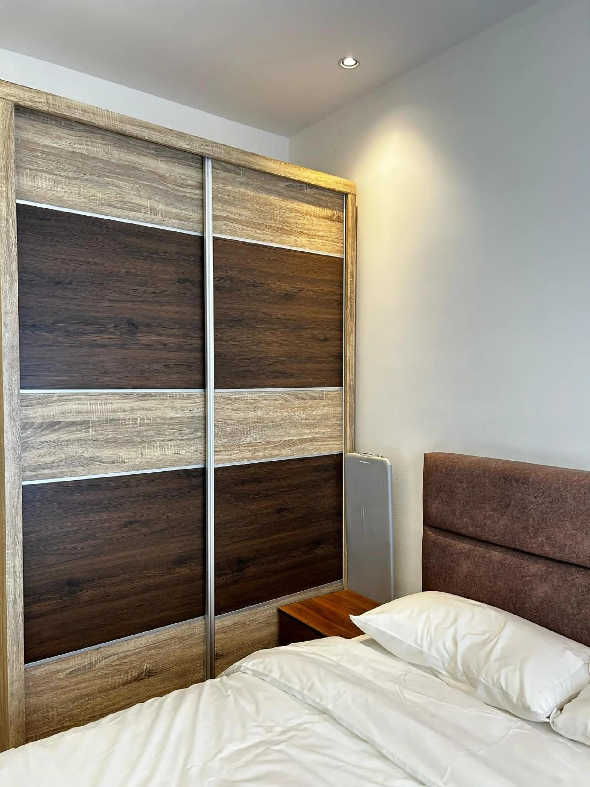 wardrobe, Bed in K Avenue by Pinstay