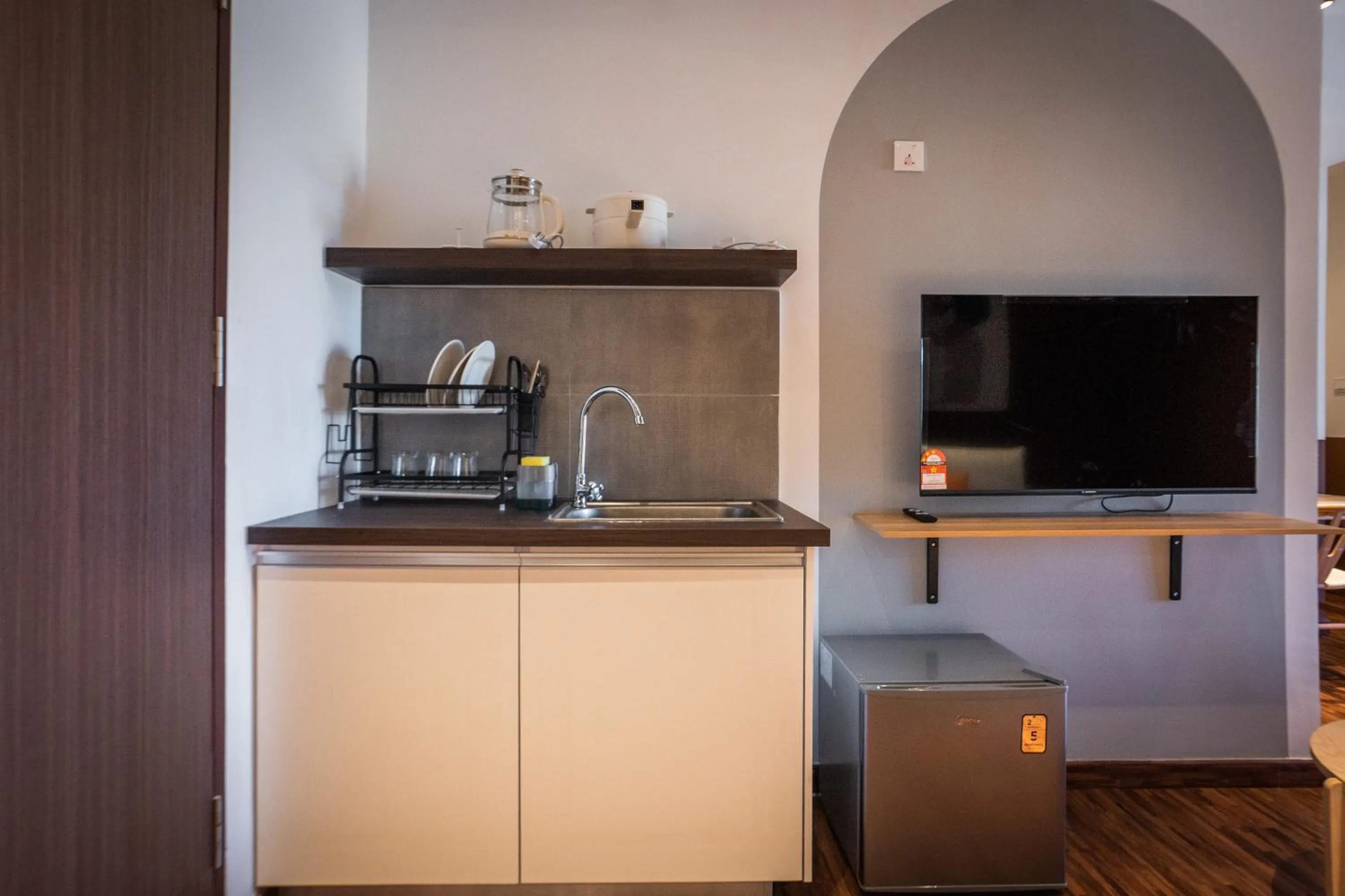 Kitchen or kitchenette in K Avenue by Pinstay