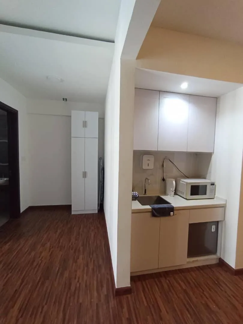 Kitchen or kitchenette in K Avenue by Pinstay