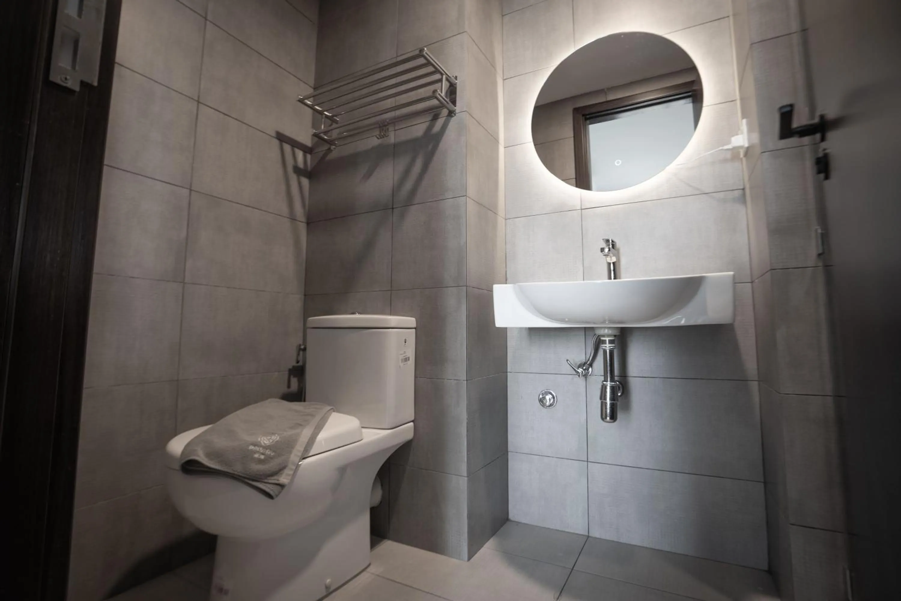 Bathroom in K Avenue by Pinstay