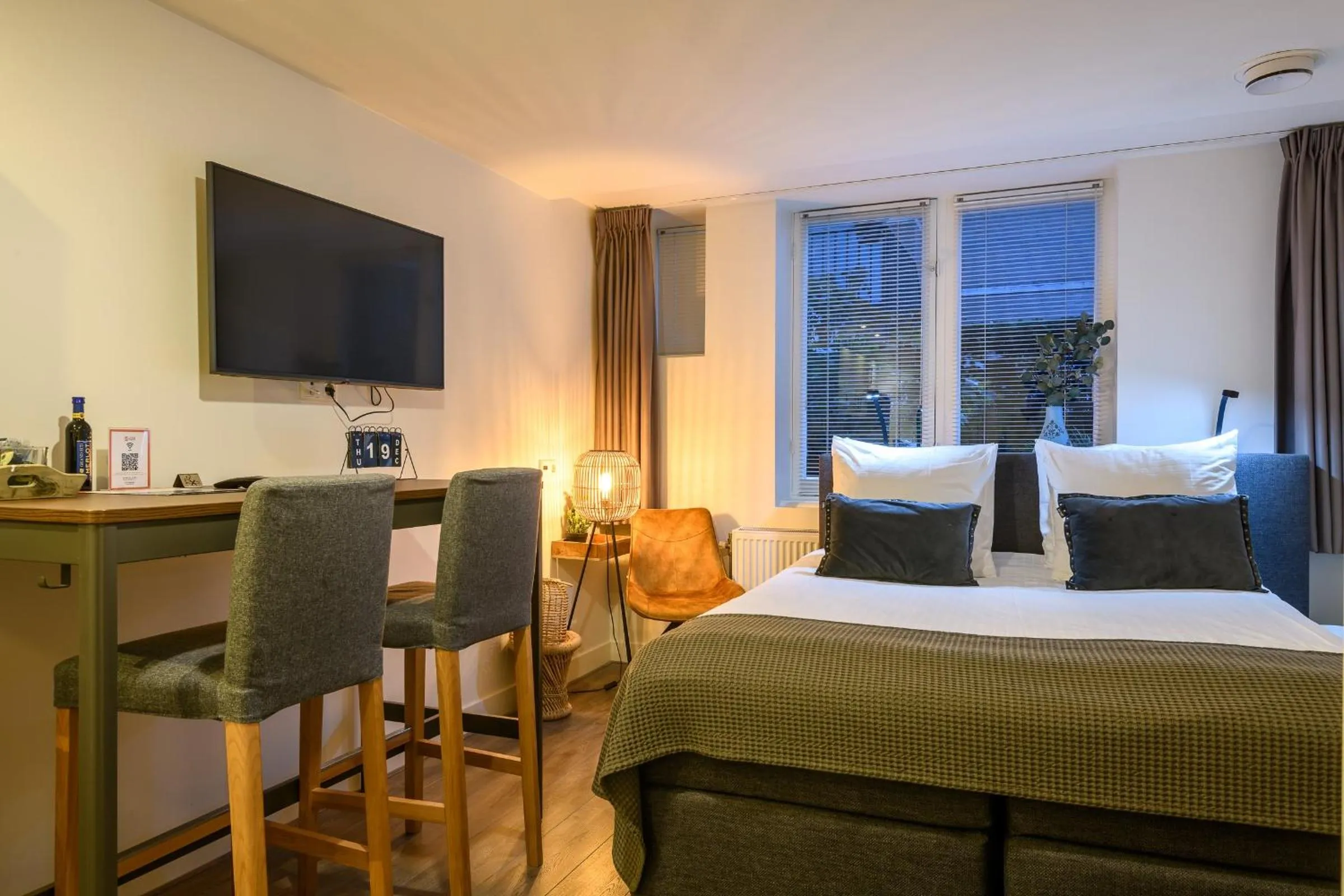 Bed in Hotel Oranjestaete