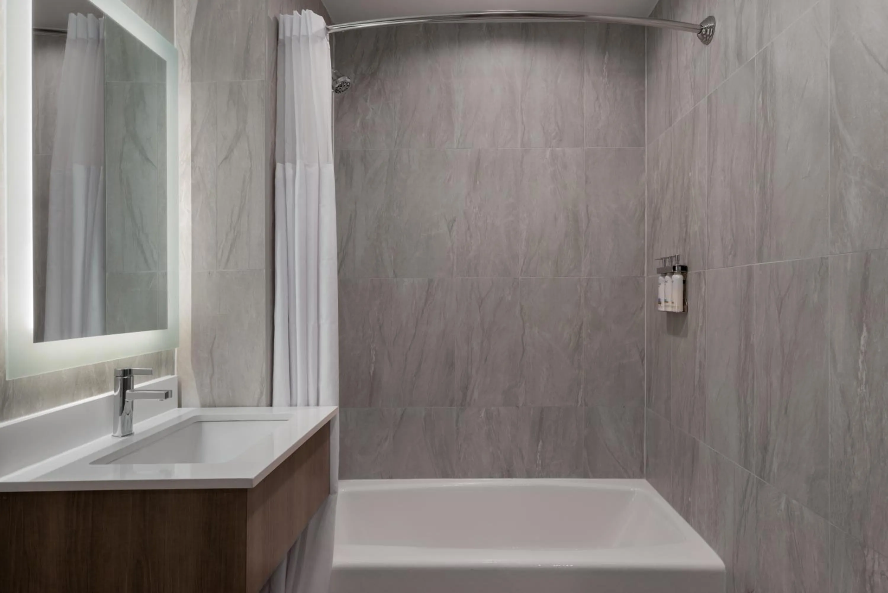 Bathroom in Holiday Inn Express & Suites Bronx - Zoo Area by IHG