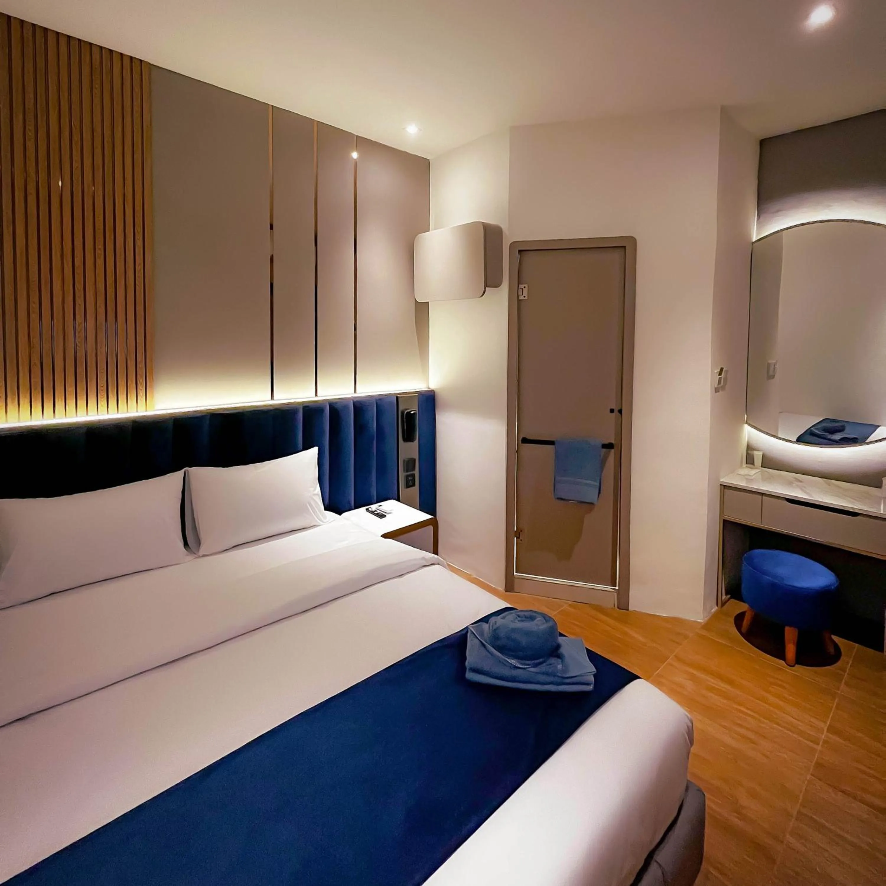Bedroom, Bed in Qube Hotel by 98hospitality