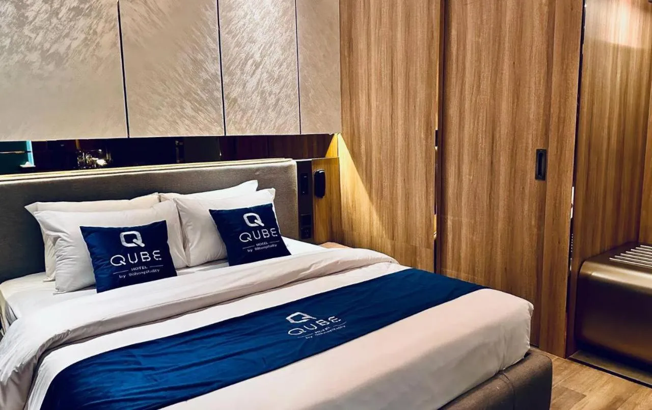 Bedroom, Bed in Qube Hotel by 98hospitality