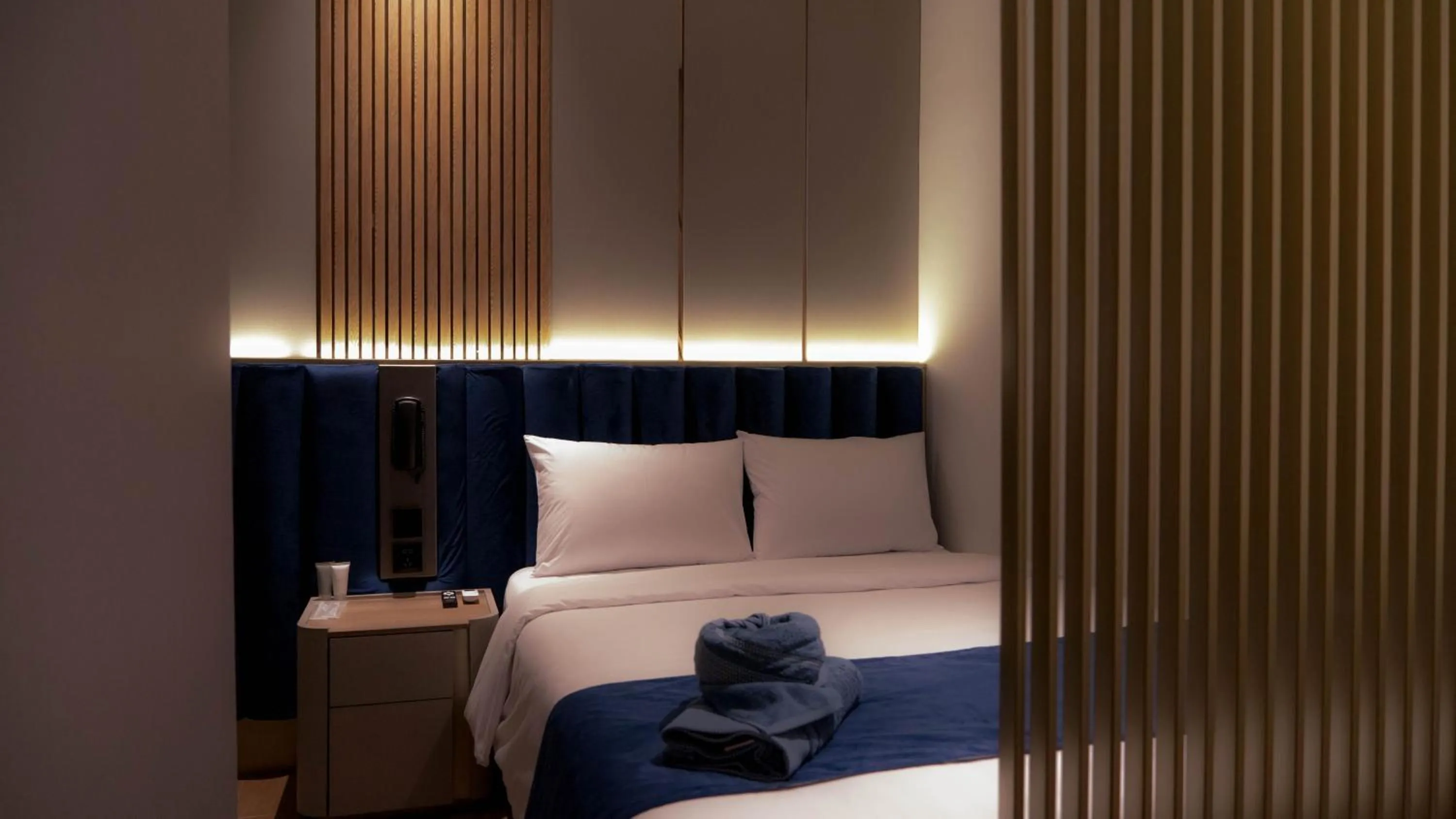 Bedroom, Bed in Qube Hotel by 98hospitality