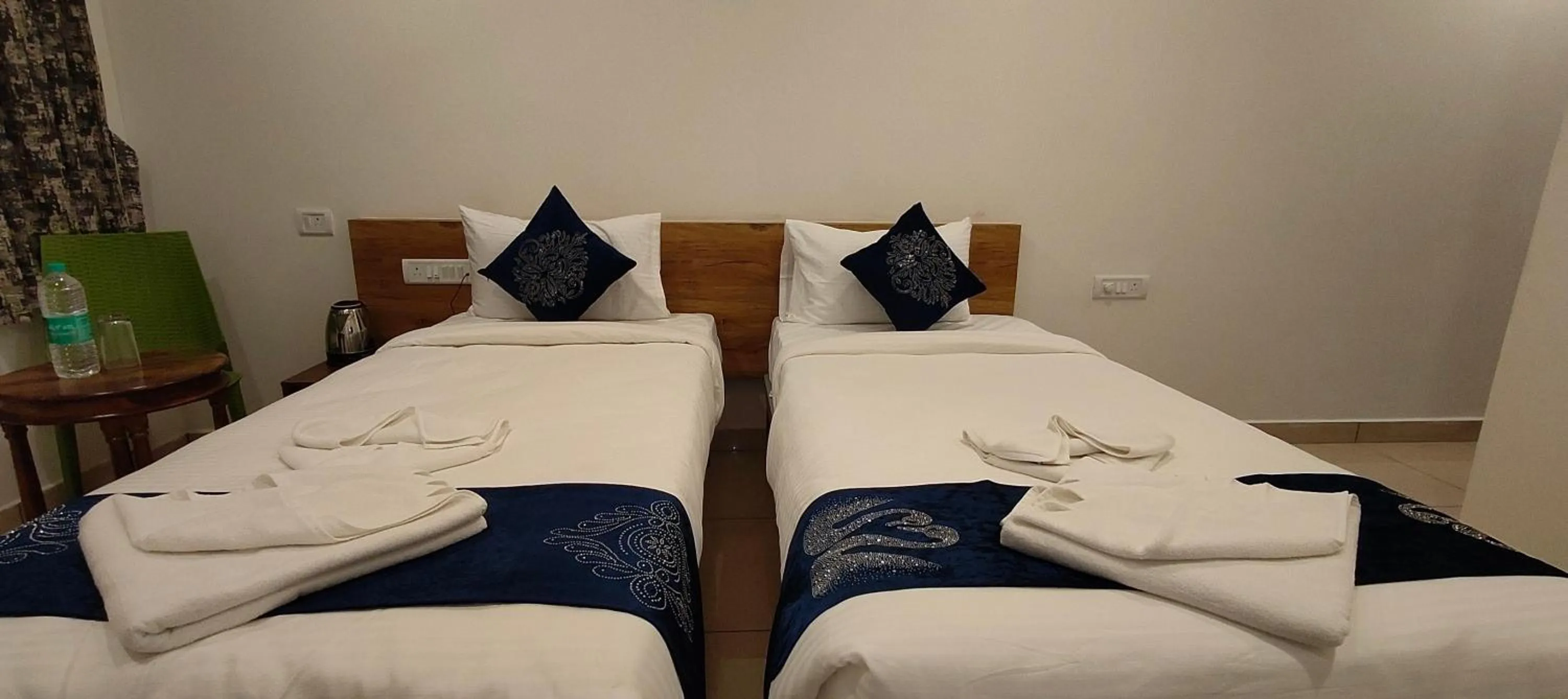 Property building, Bed in Hotel Amulya Regency