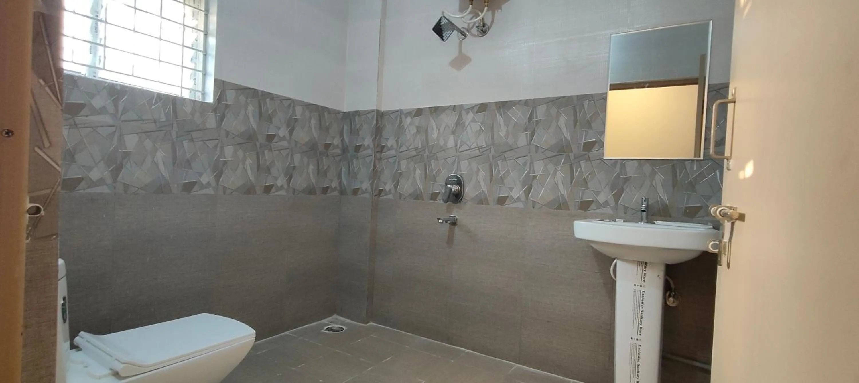 Bathroom in Hotel Amulya Regency