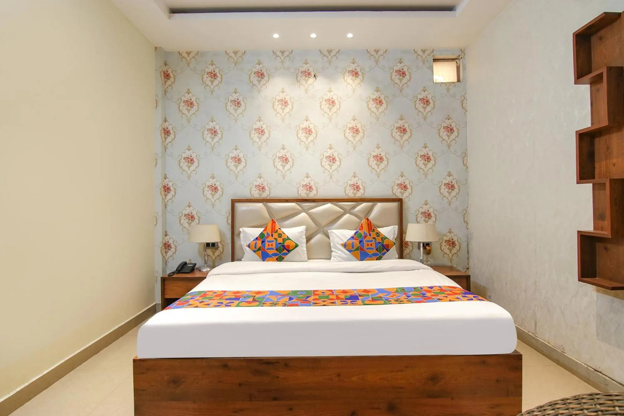 Bed in FabHotel K9 Regency