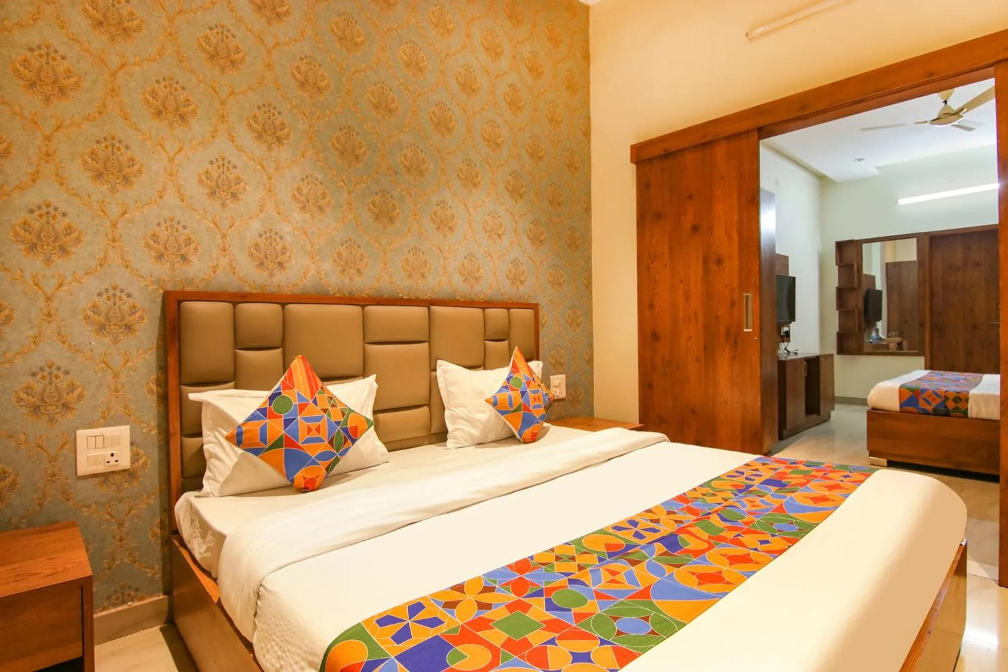 Bed in FabHotel K9 Regency