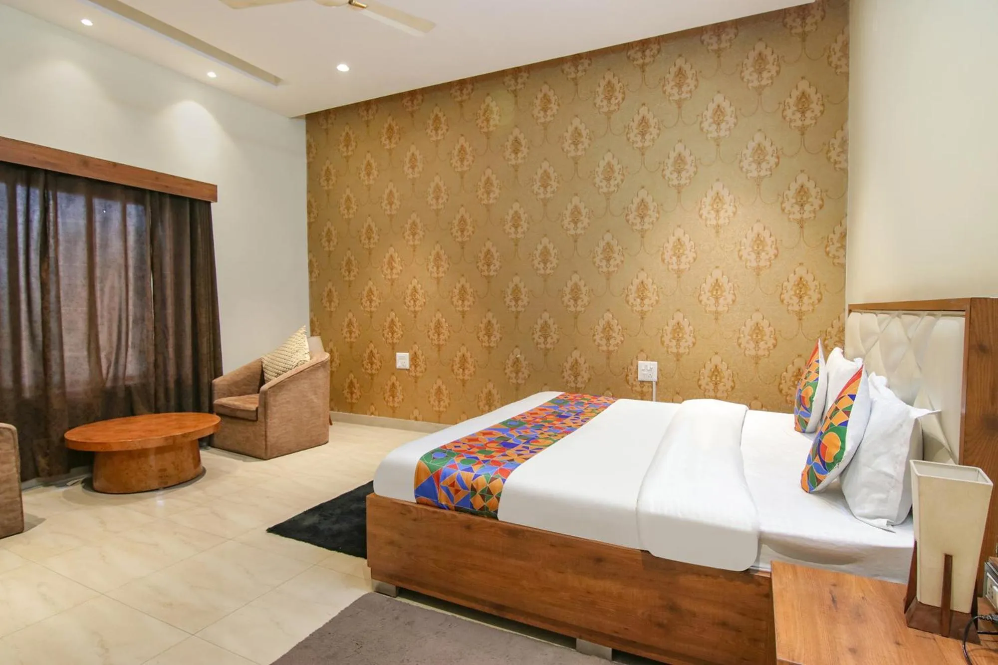 Bed in FabHotel K9 Regency