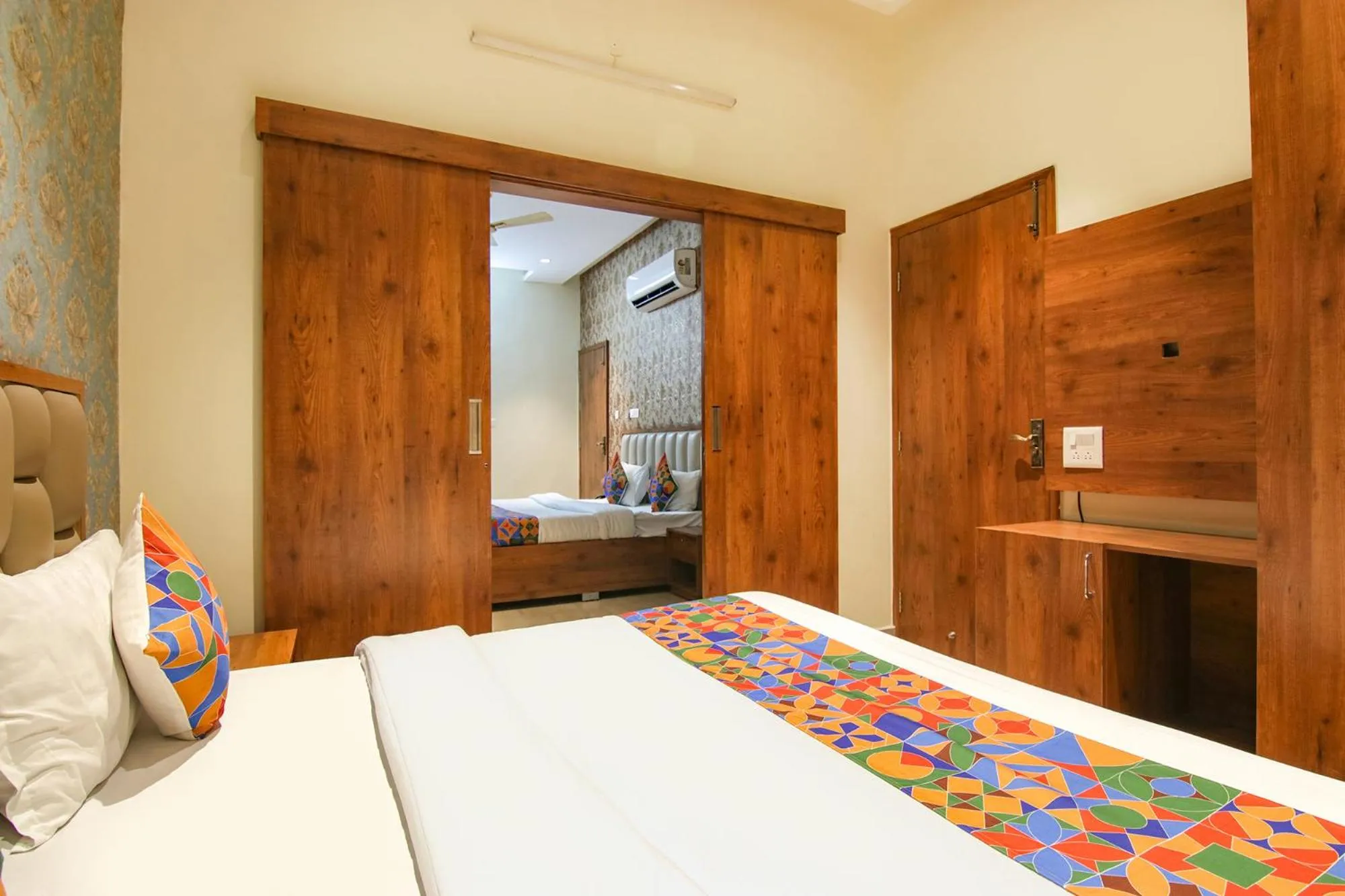 Bed in FabHotel K9 Regency