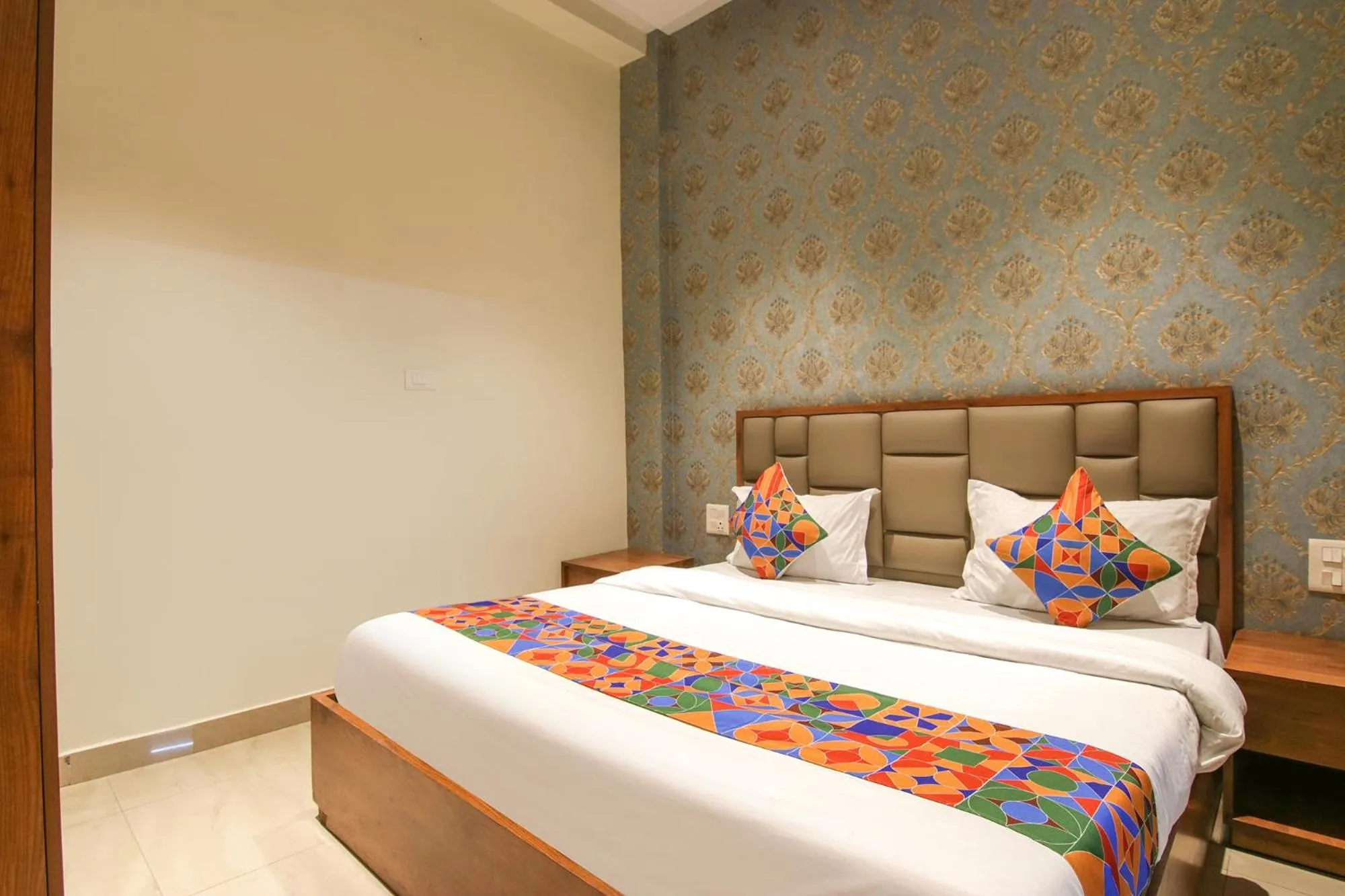Bed in FabHotel K9 Regency