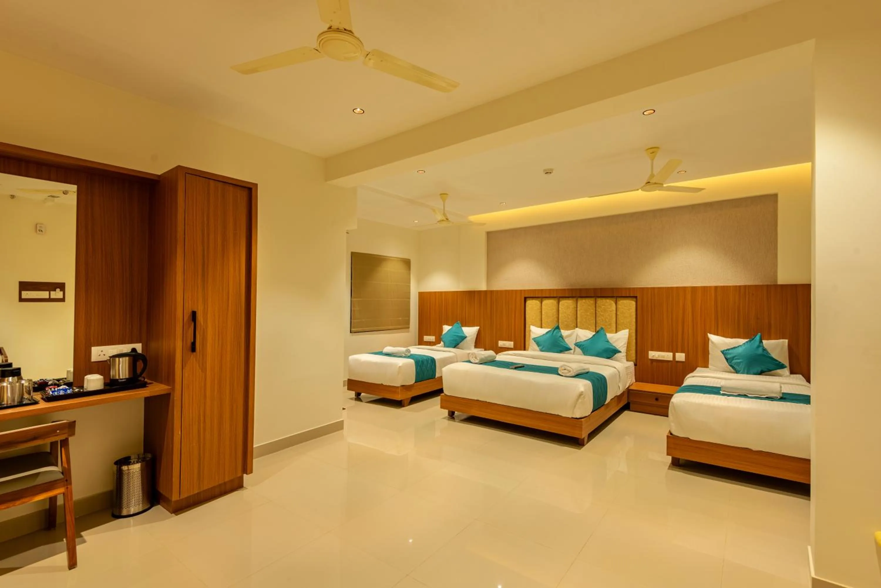 Bed in Hotel Stay Bella Kozhikode