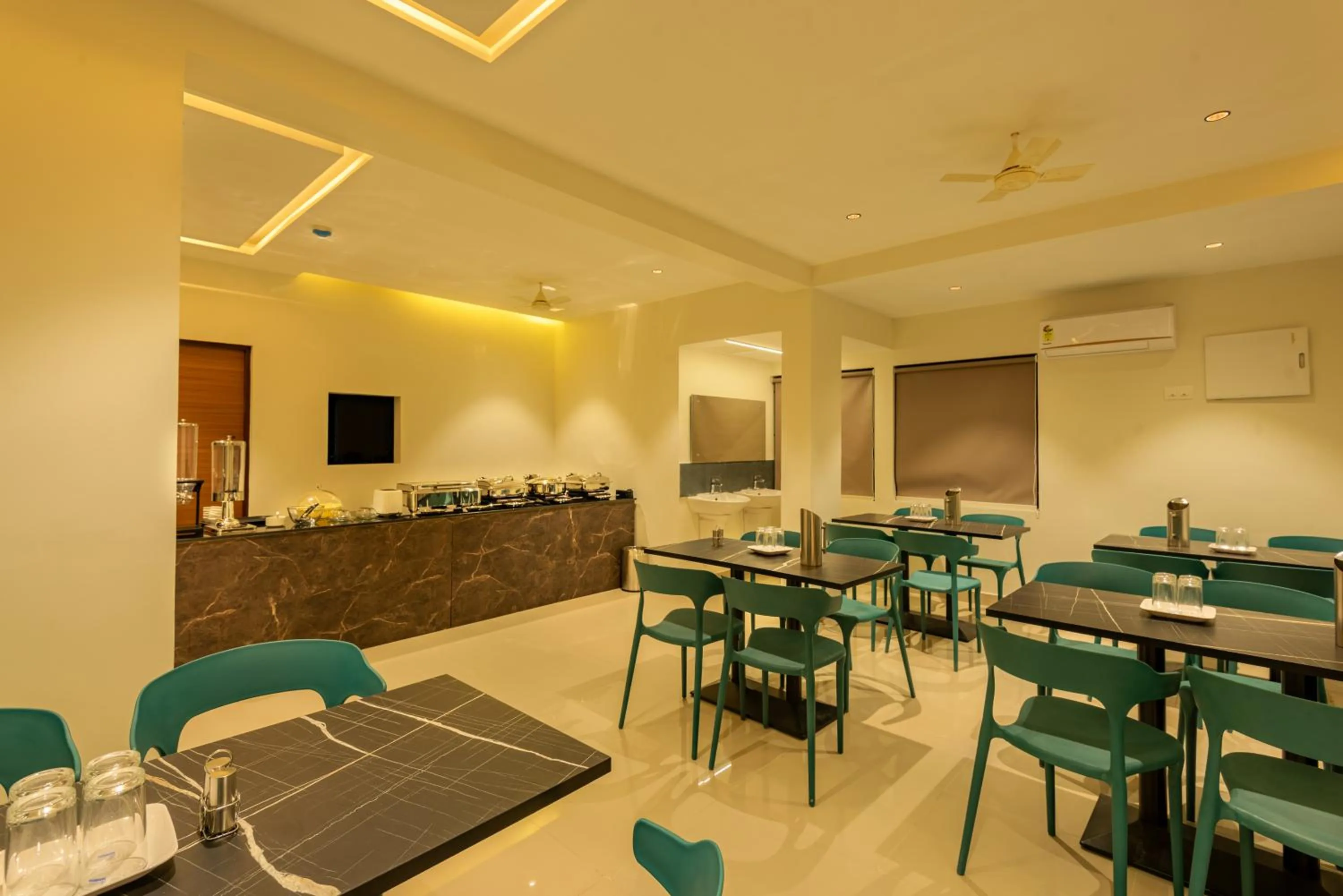 TV and multimedia in Hotel Stay Bella Kozhikode