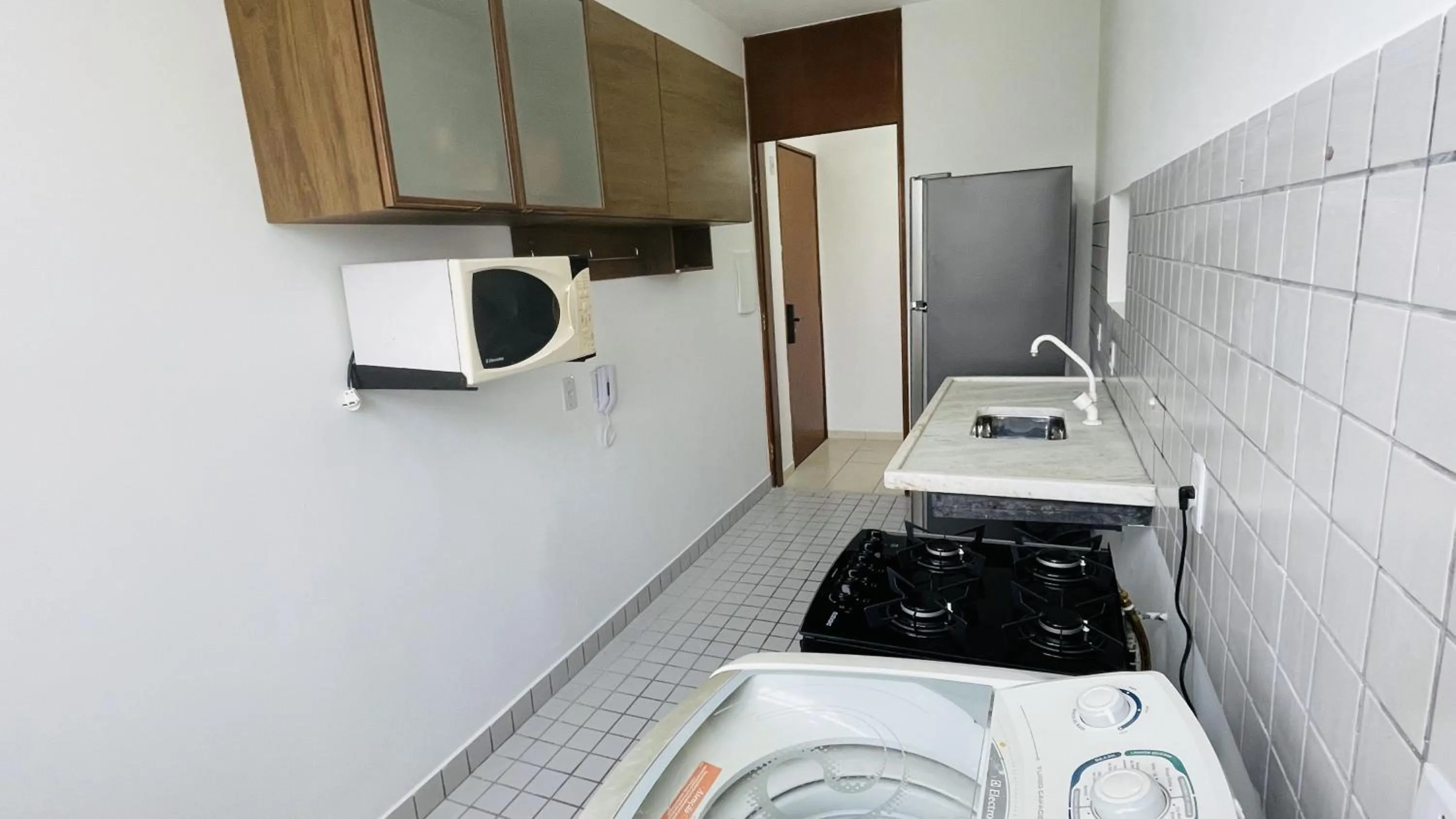 kitchen in Na Enseada c/ Wifi e Ar-Cond.