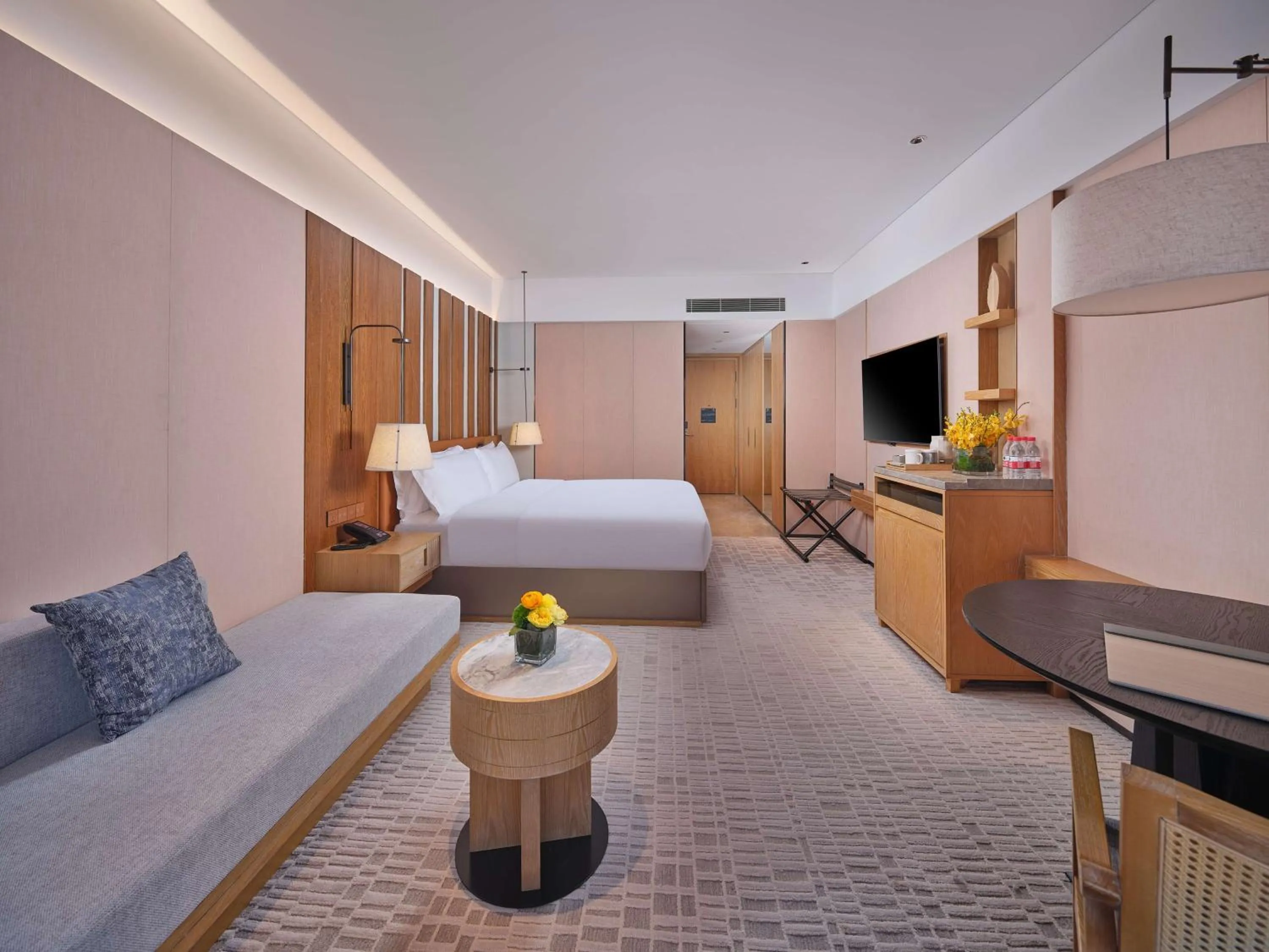 Living room, Bed in DoubleTree by Hilton Changbaishan Hot Spring