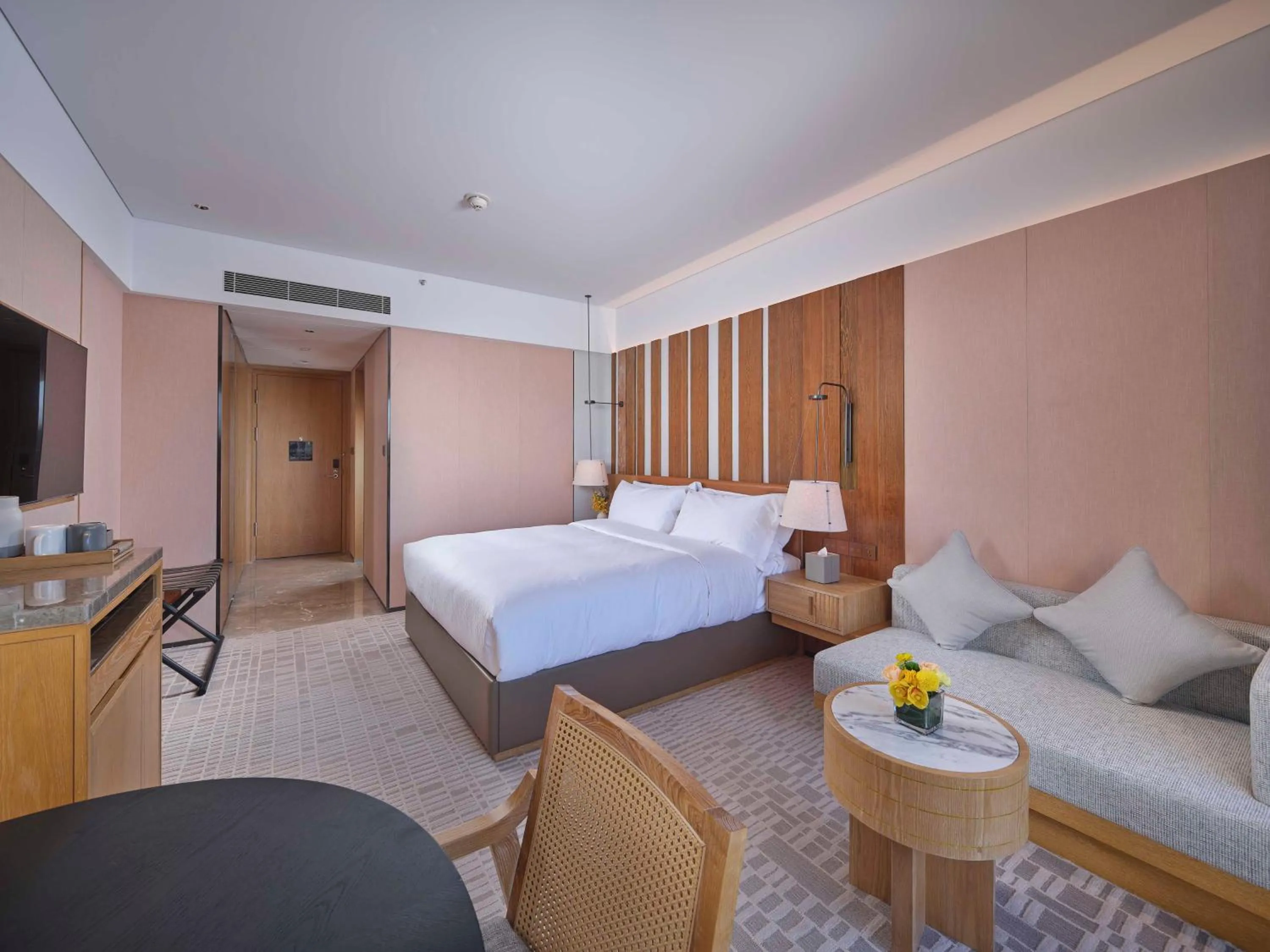 Bed in DoubleTree by Hilton Changbaishan Hot Spring