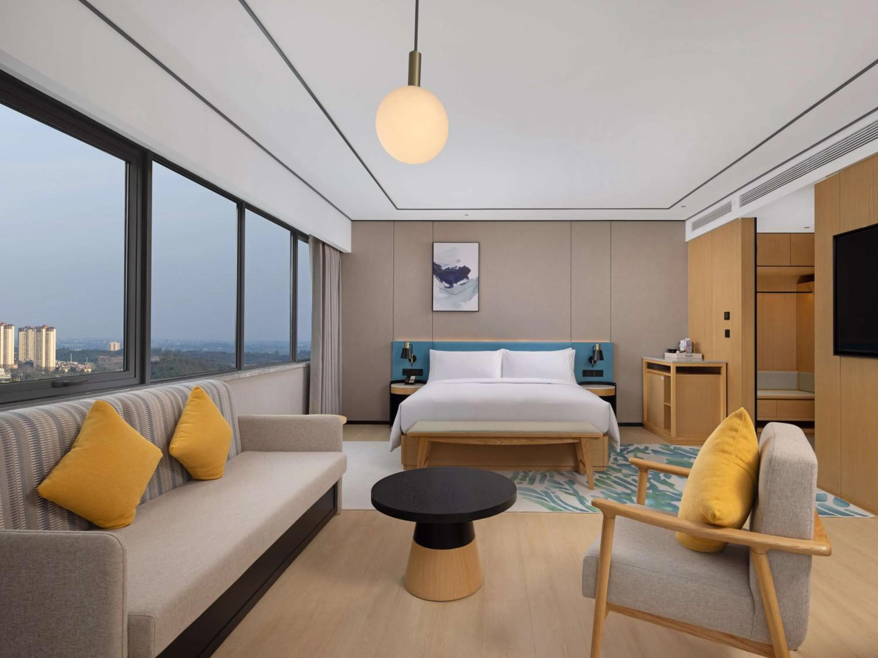 Living room, Bed in Hilton Garden Inn Zigong High-Tech Zone