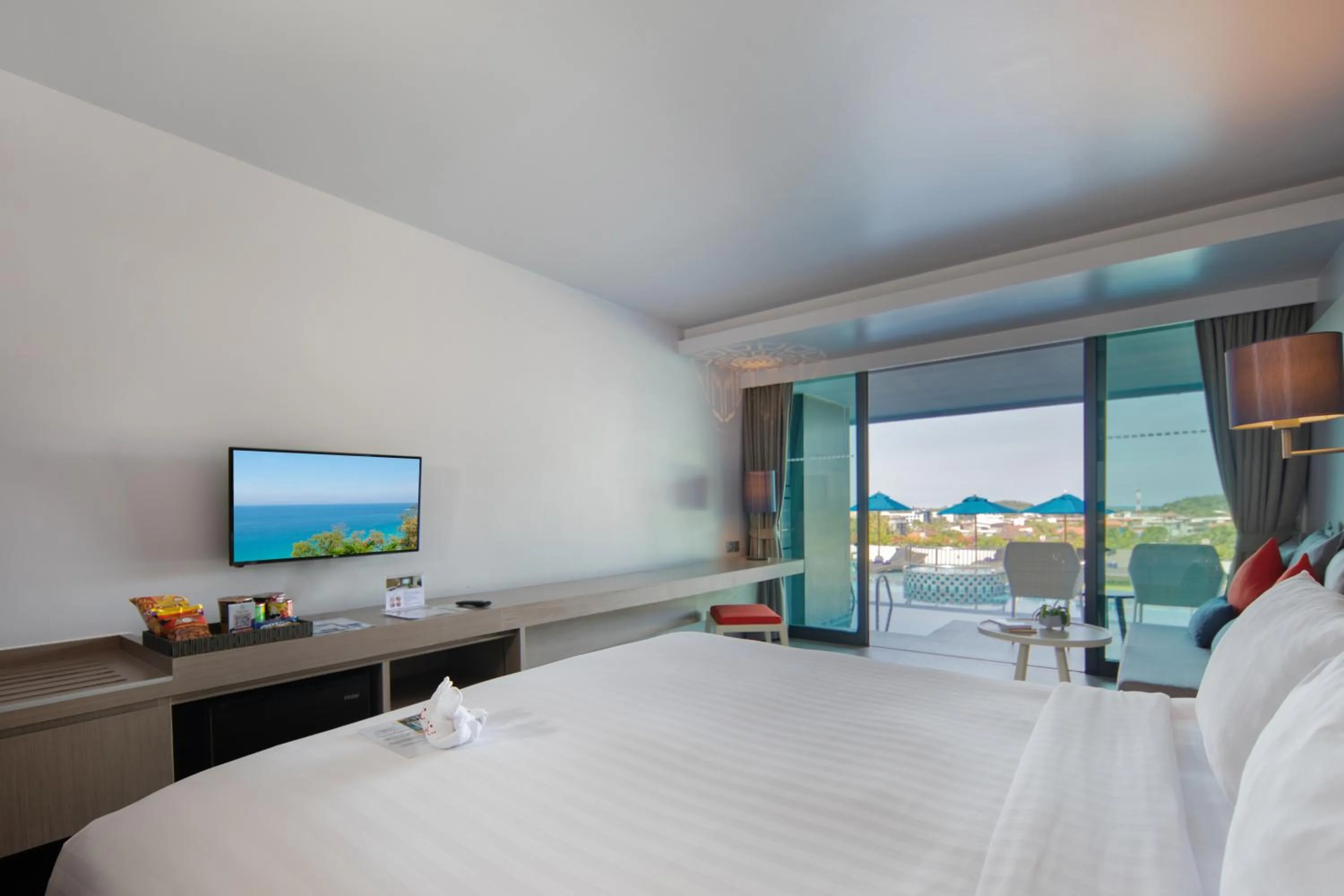 Pool view, Bed in The Yama Hotel Phuket