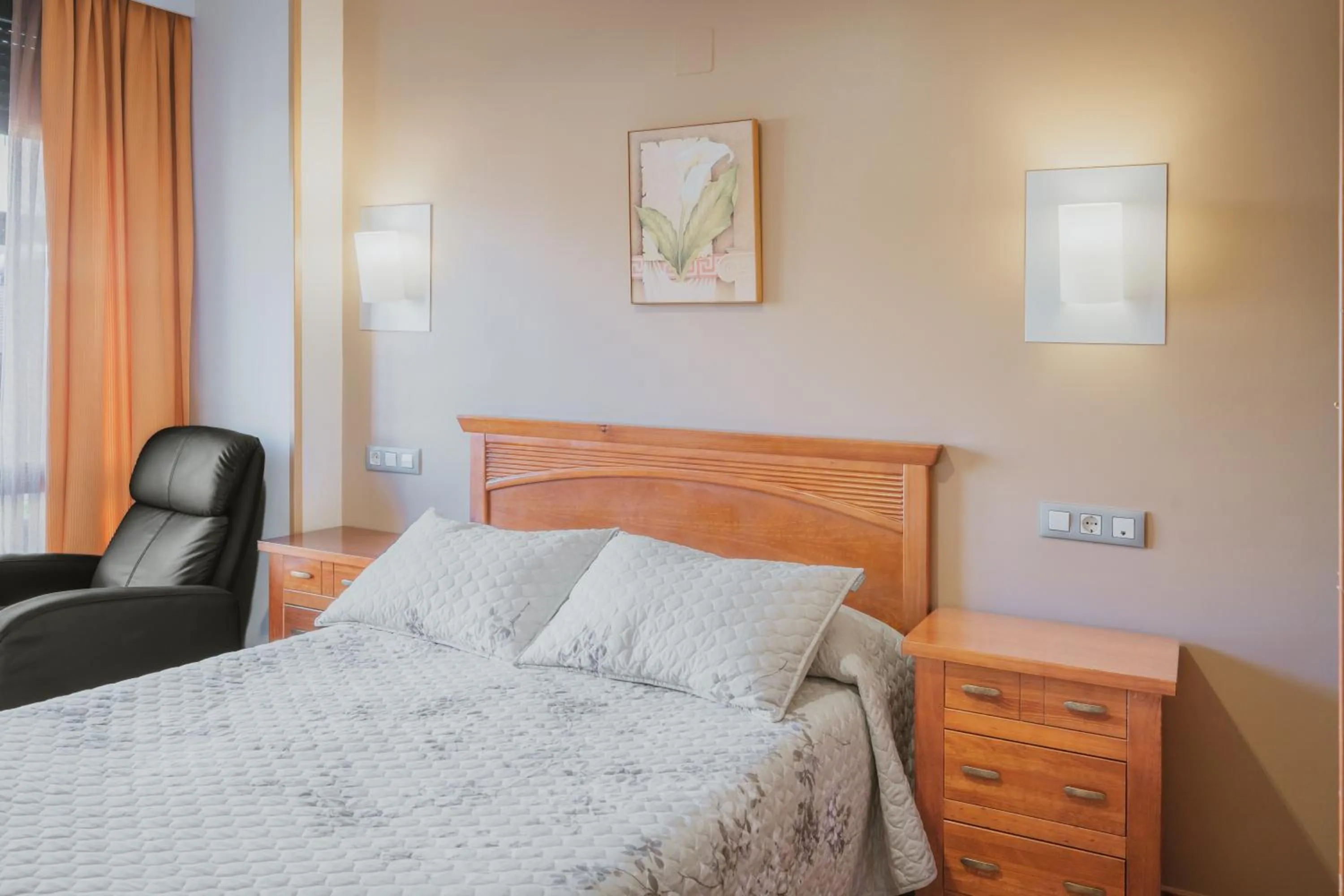 Bed in Hotel Reina Isabel