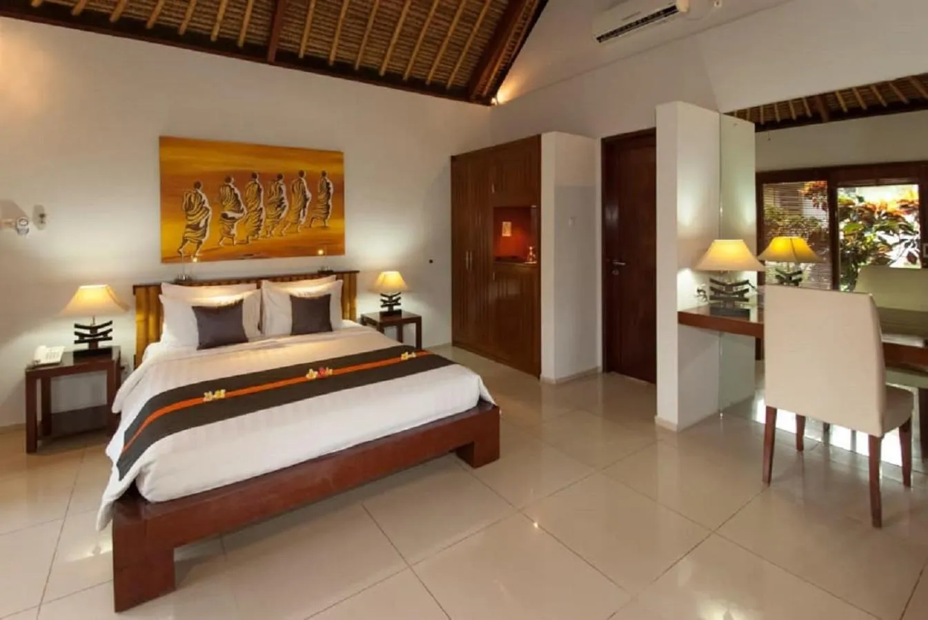 Bed in Siddhartha Oceanfront Resort & Spa Bali