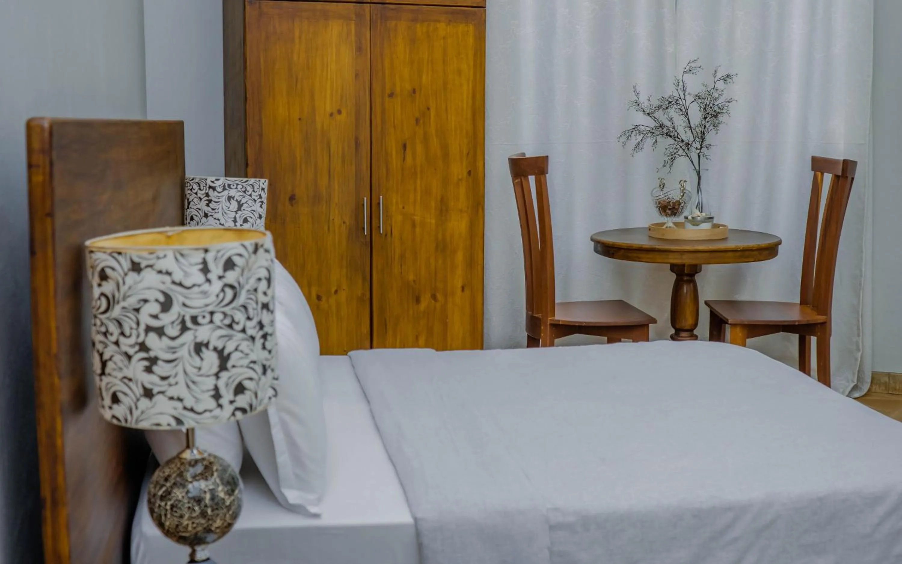 Bed in Tulivu Kilimanjaro Retreat