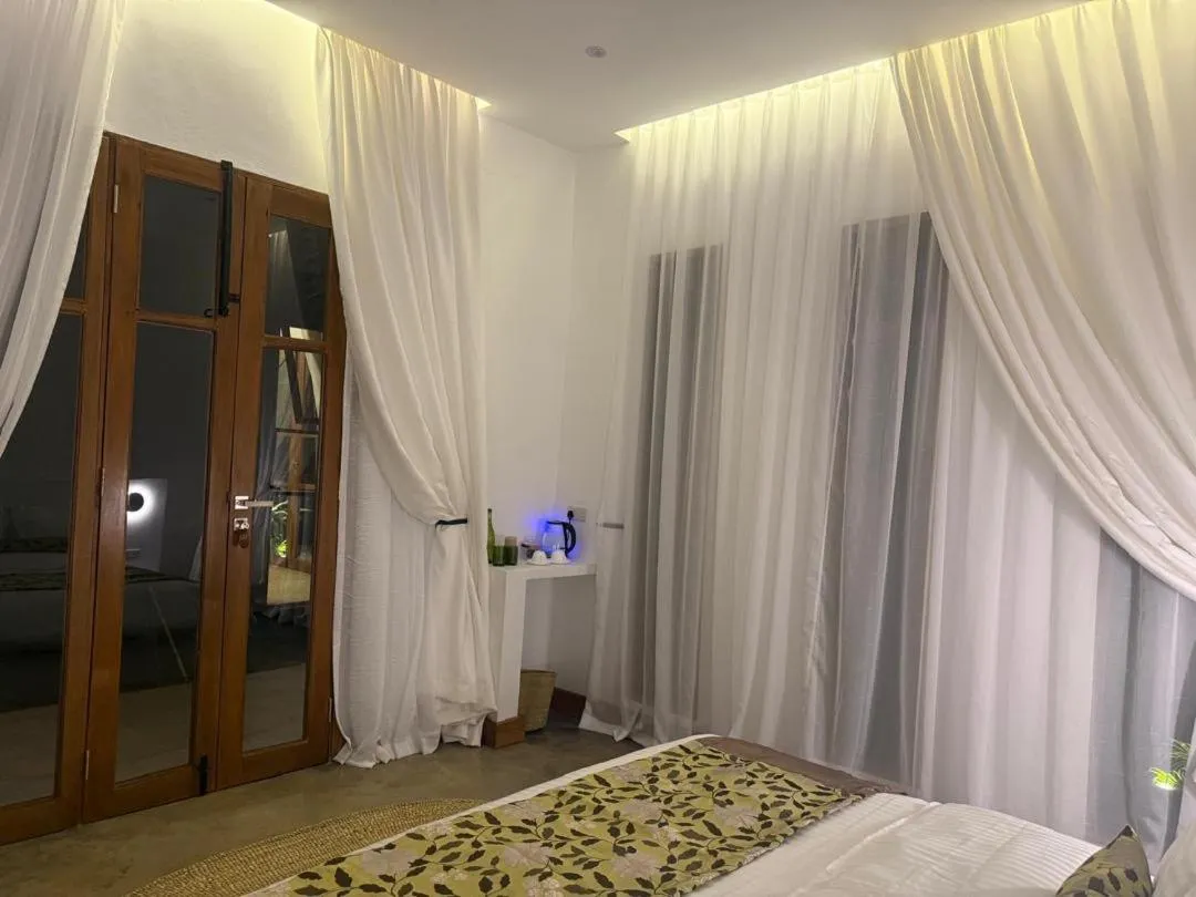 Bed in Tulivu Kilimanjaro Retreat