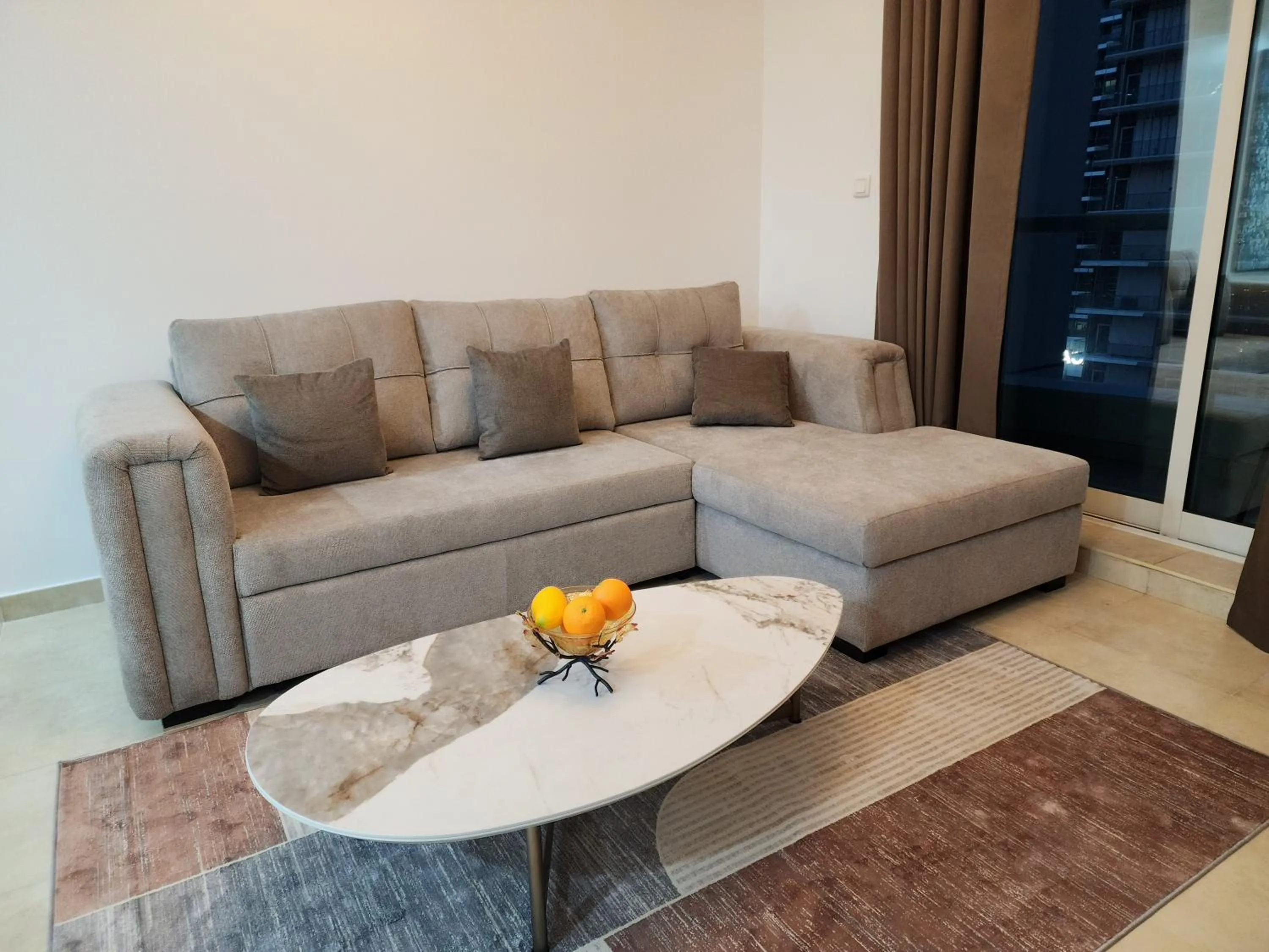 Living room in Preatoni Tower - JLT by Golden Casa