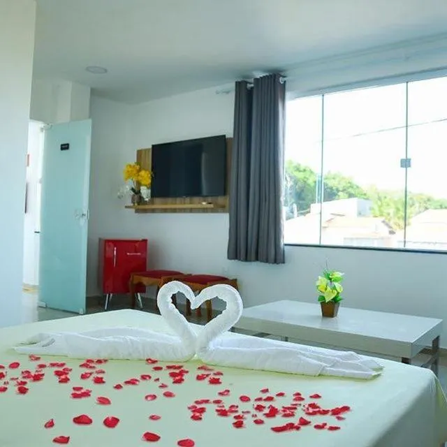 Bed in Pousada Diamante