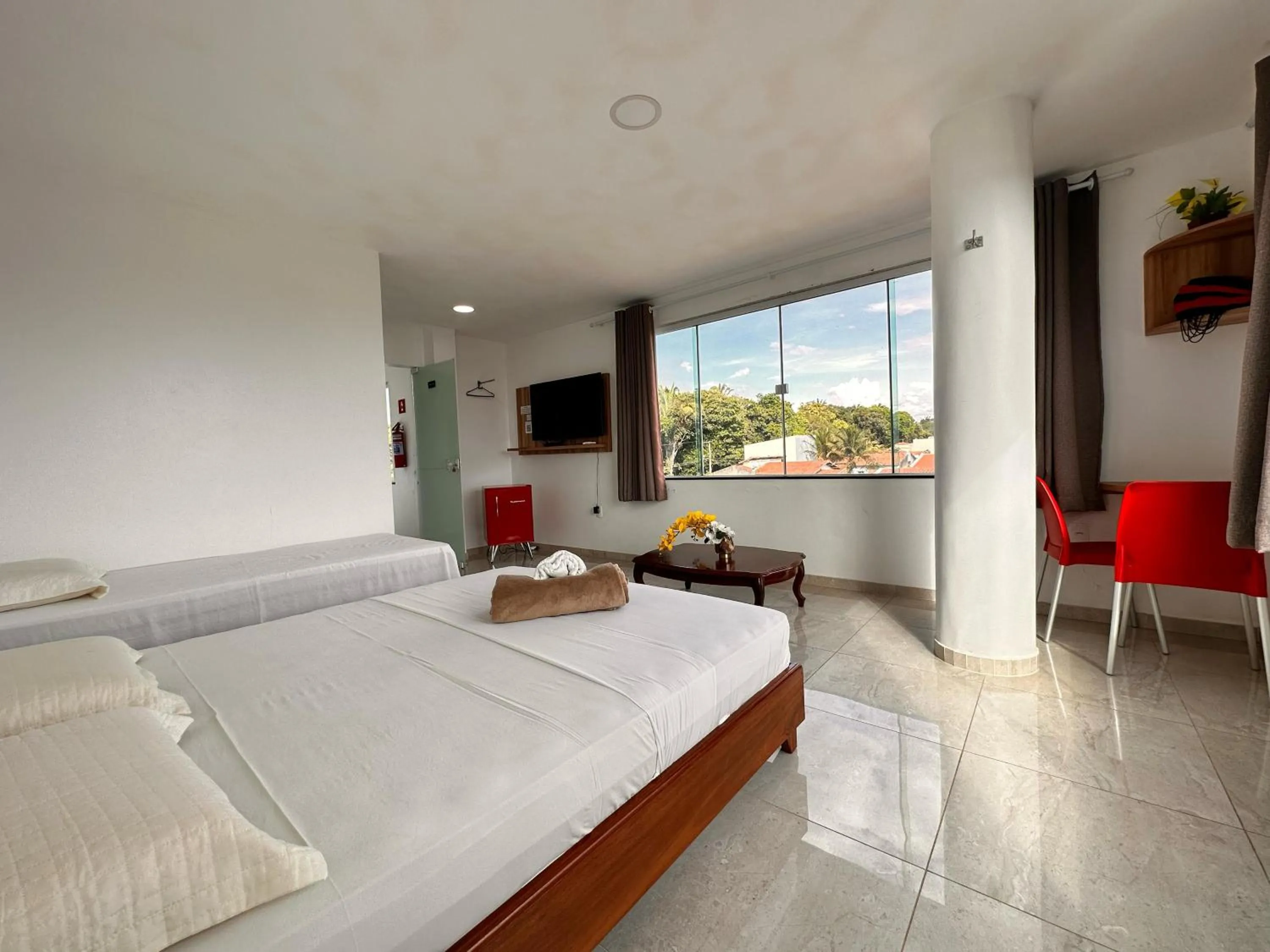 Bed in Pousada Diamante