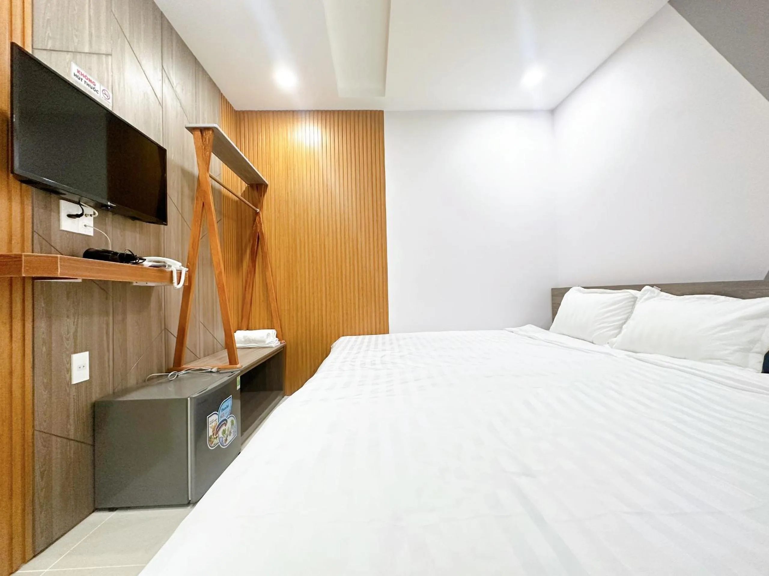 Bed in Milanesa Hotel and Apartment