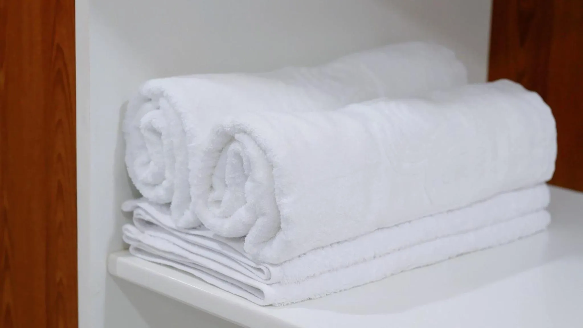 towels, Bed in Milanesa Hotel and Apartment