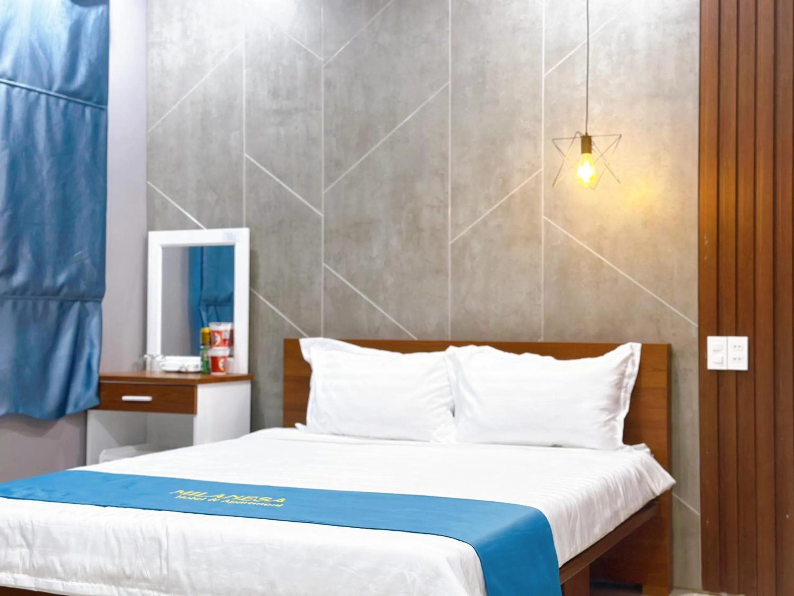 Bed in Milanesa Hotel and Apartment