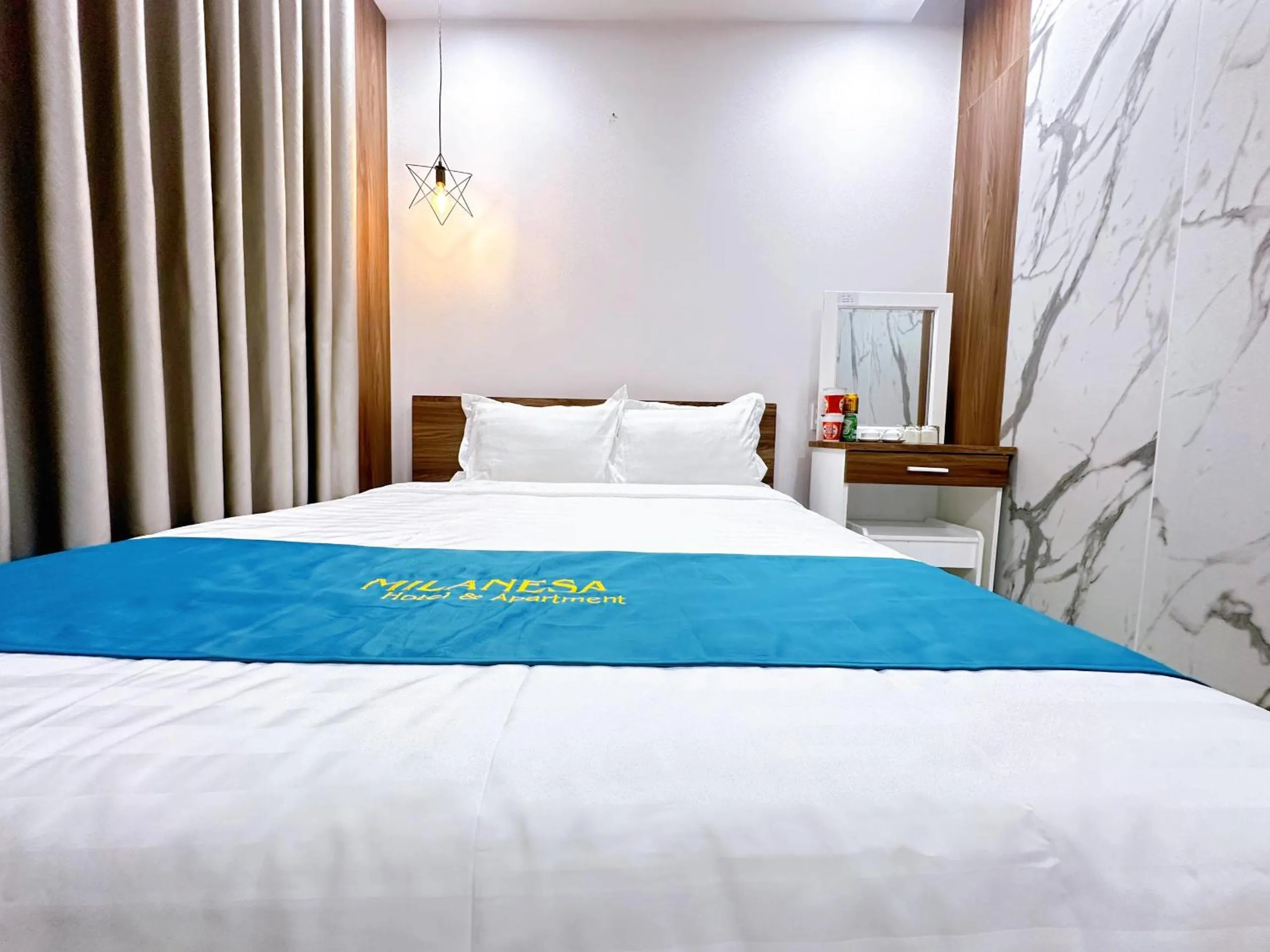Bed in Milanesa Hotel and Apartment