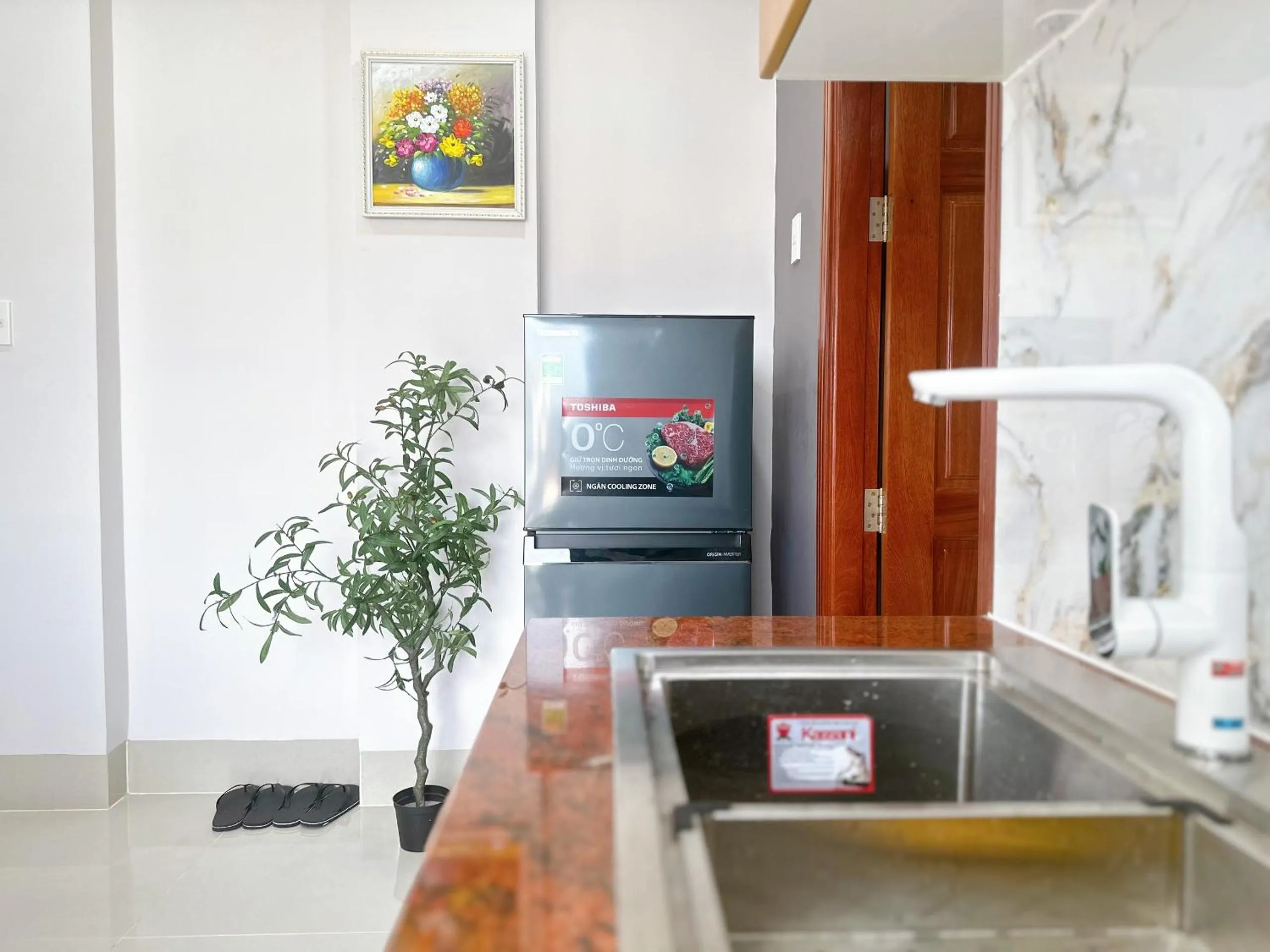 Kitchen or kitchenette in Milanesa Hotel and Apartment