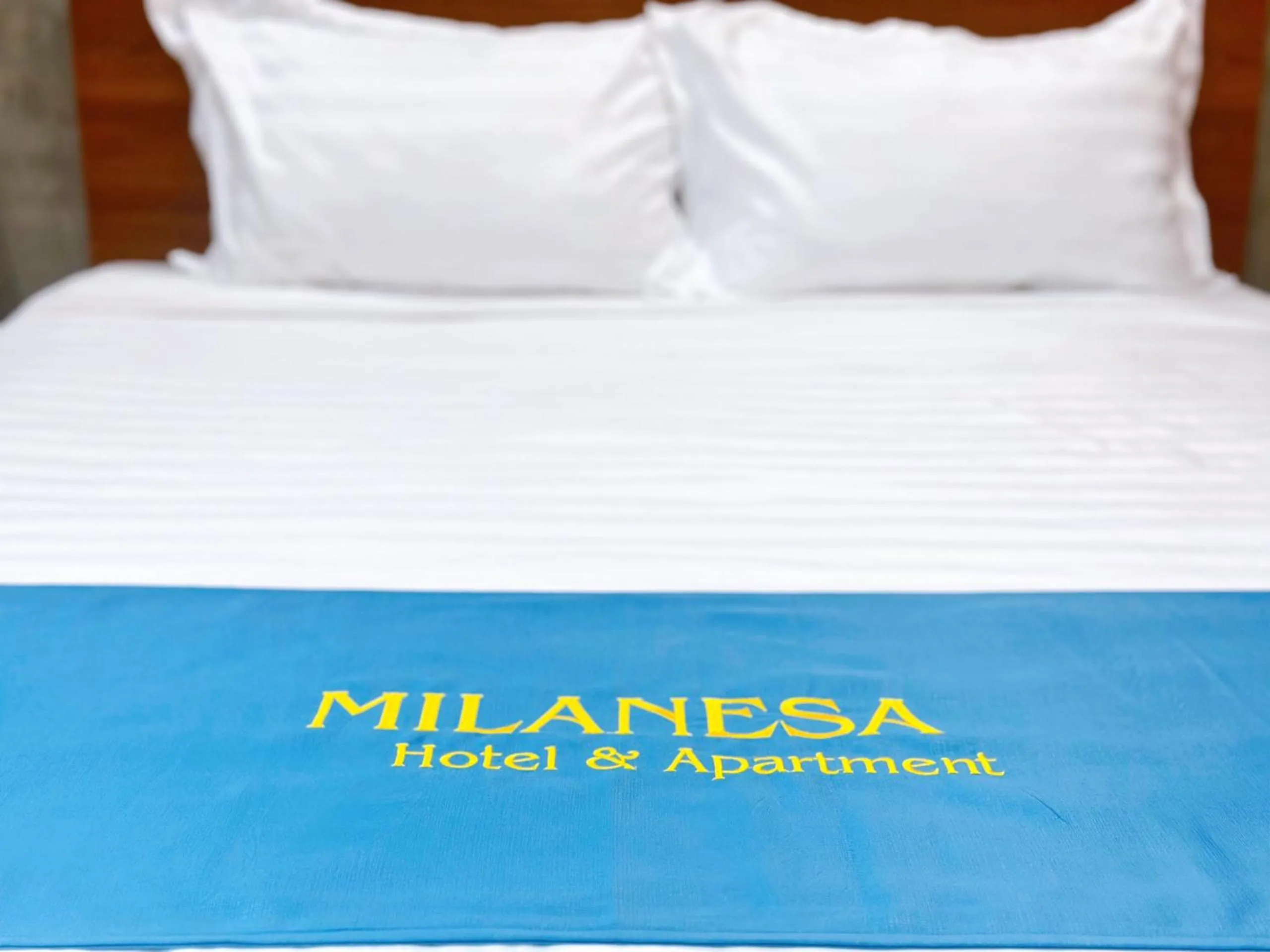 Bed in Milanesa Hotel and Apartment
