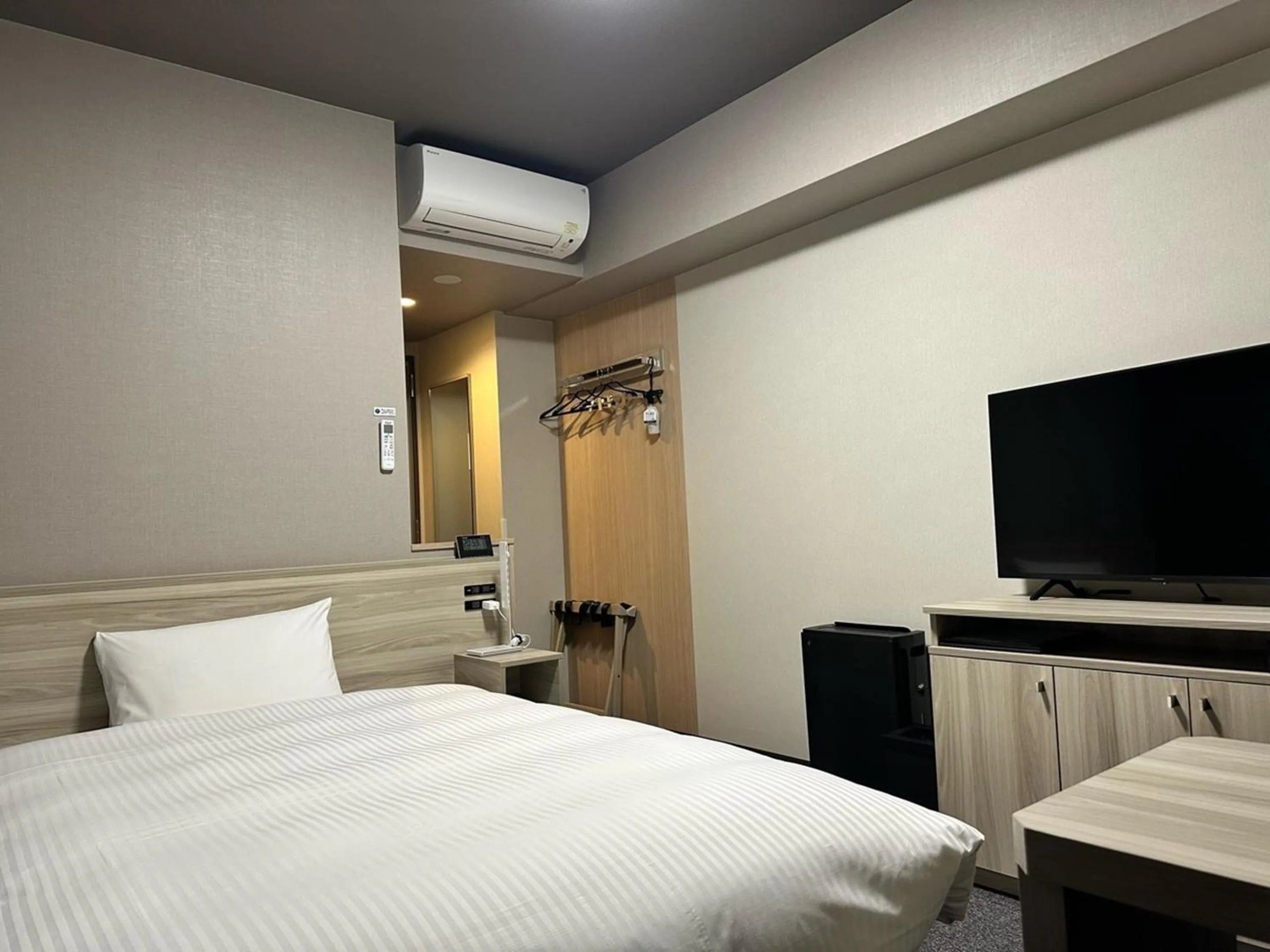 Photo of the whole room, Bed in Hotel Route Inn Fukushima Nishi Inter