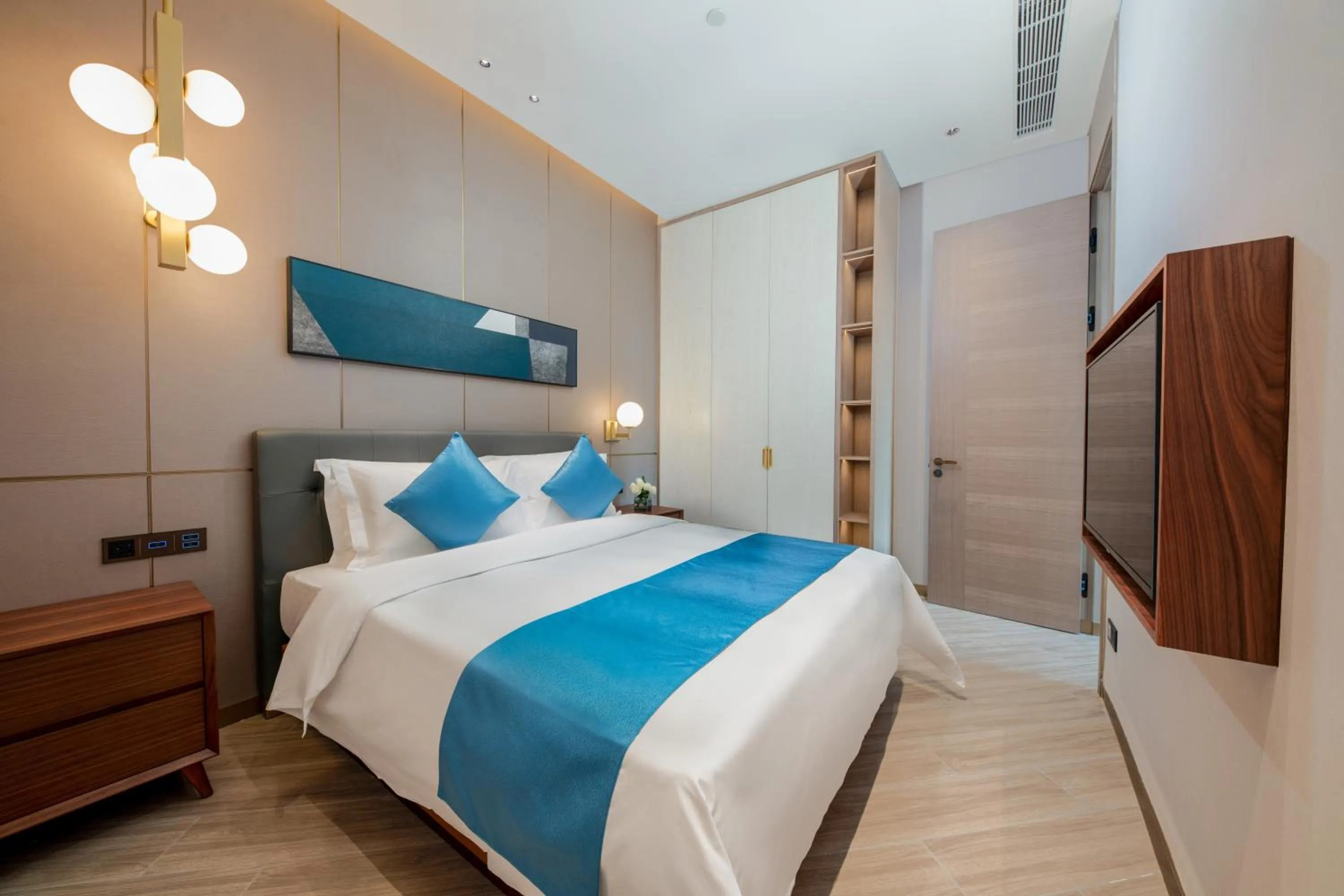 Bed in Shan Zhi Ye Serviced Apartment Hotel - Houjie Wanda Plaza Liaoxia Subway Station