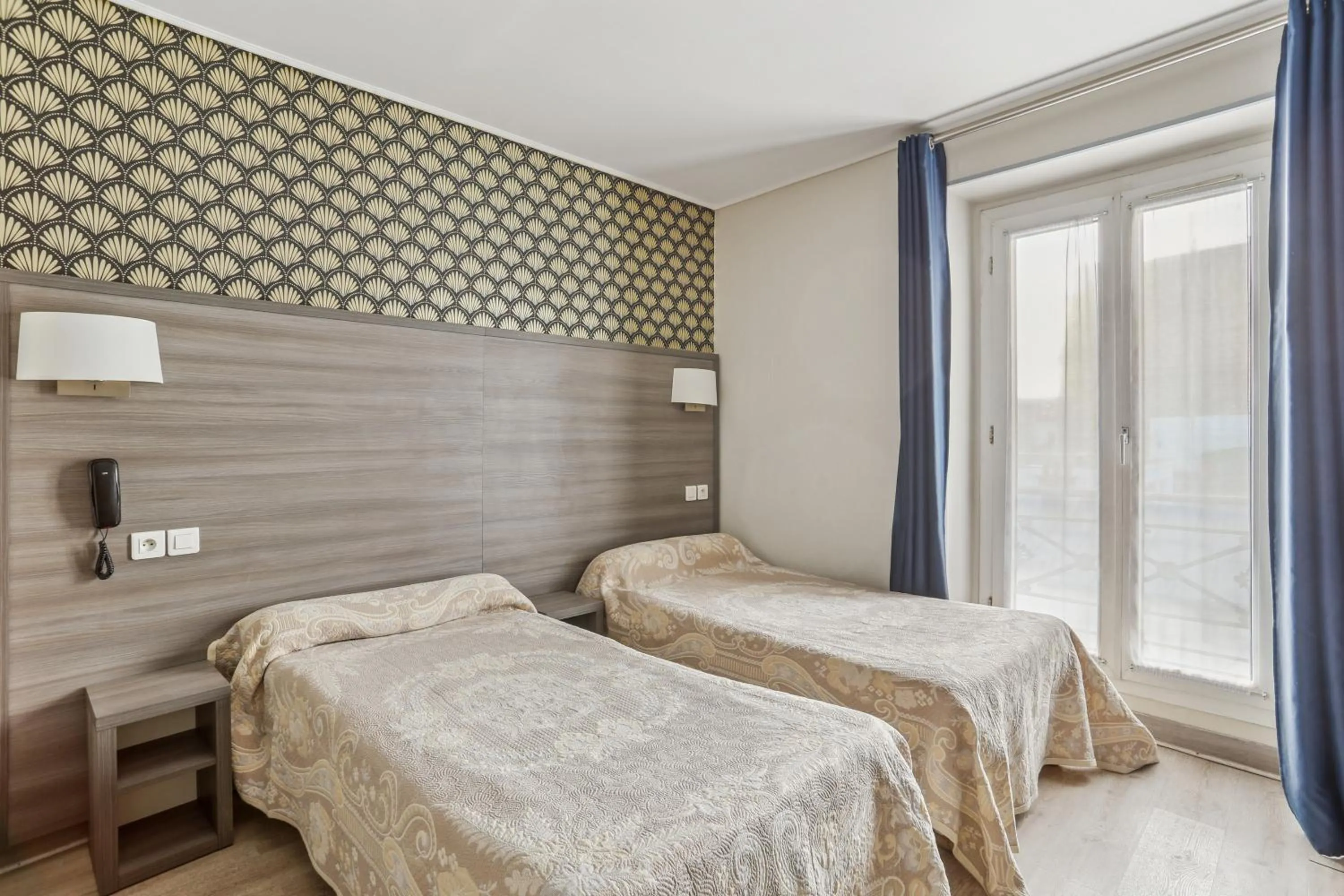 Bed in Hotel Telemaque