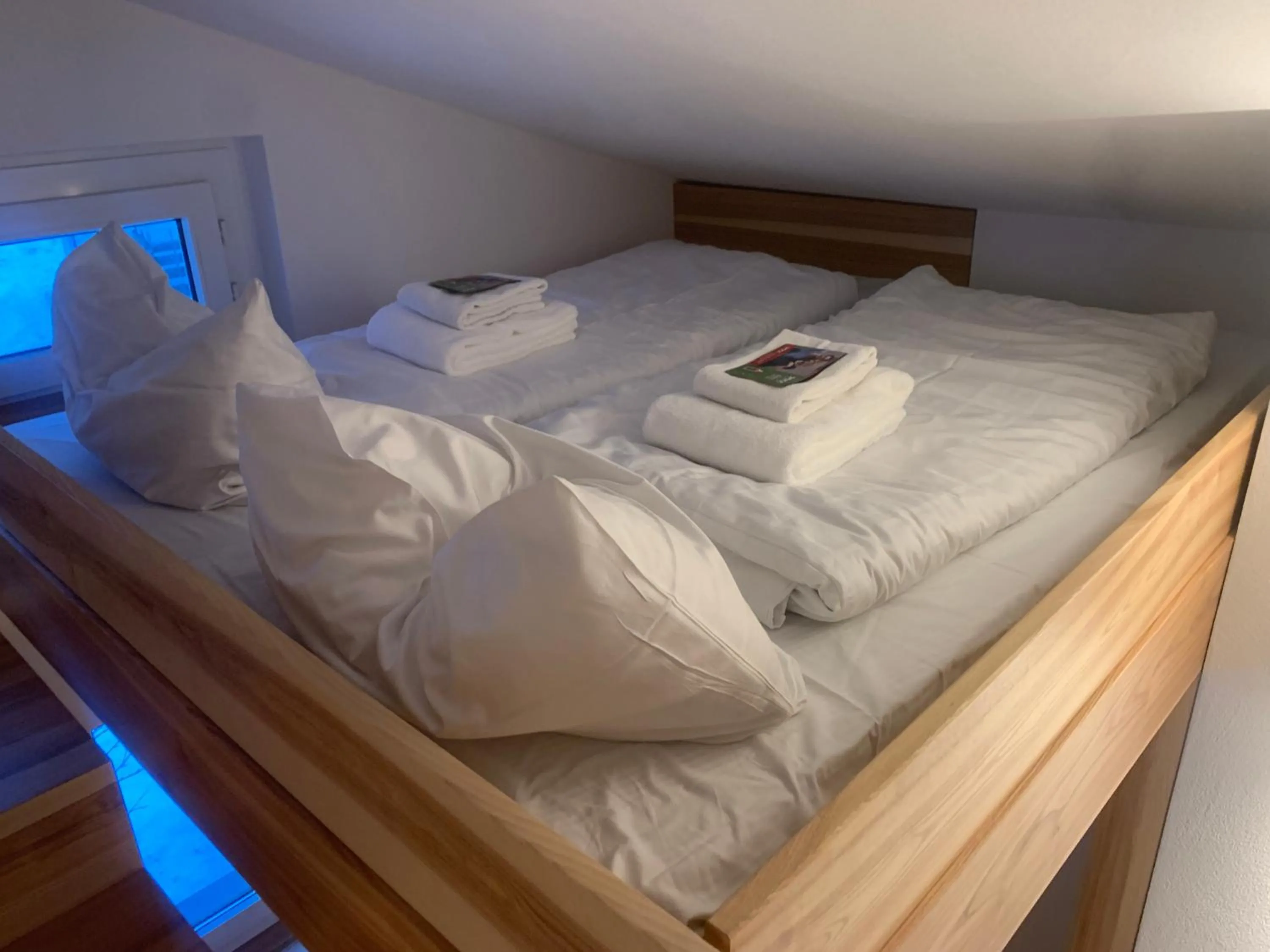 Bed in Ferienwohnung Murschetg