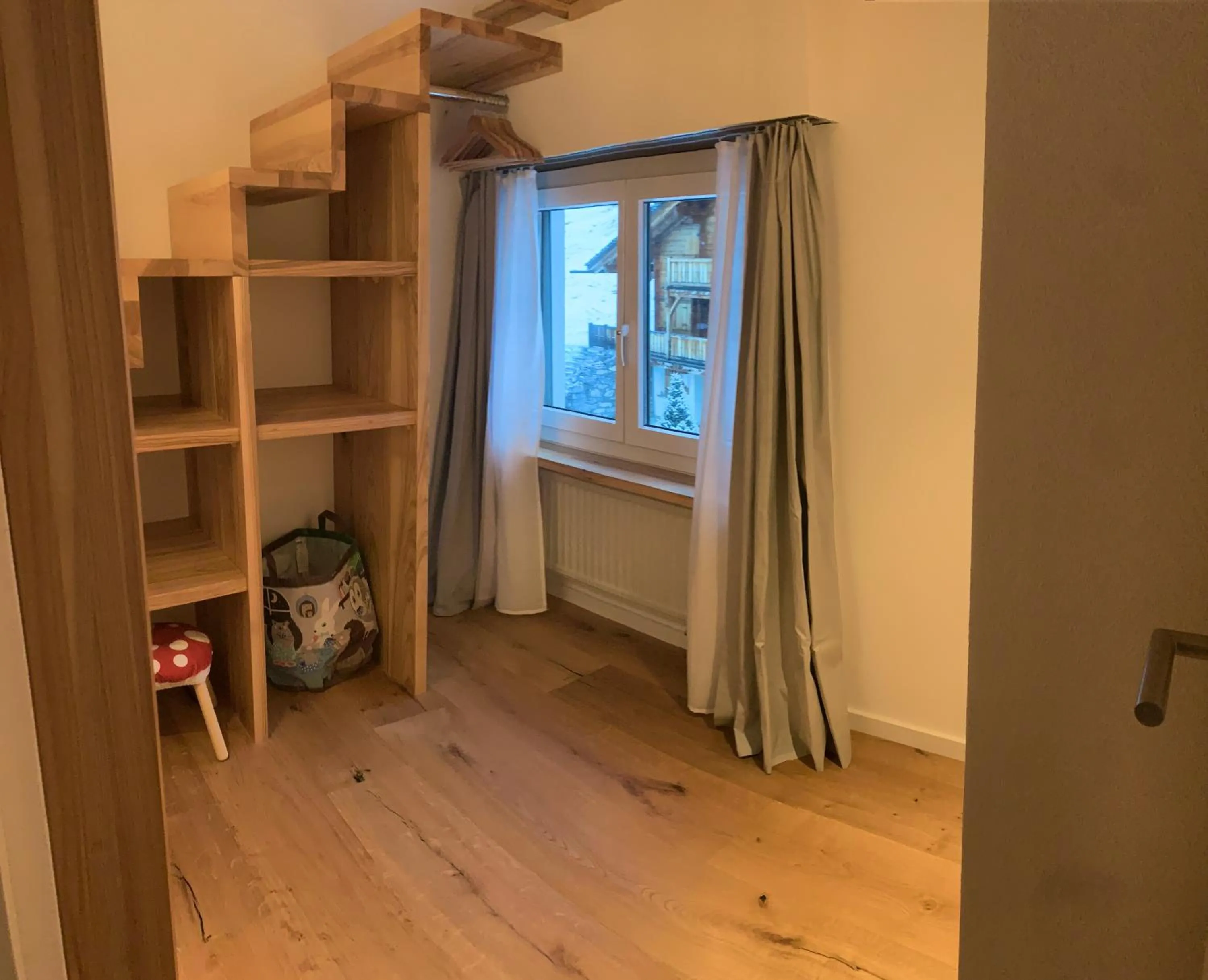 Bedroom in Ferienwohnung Murschetg